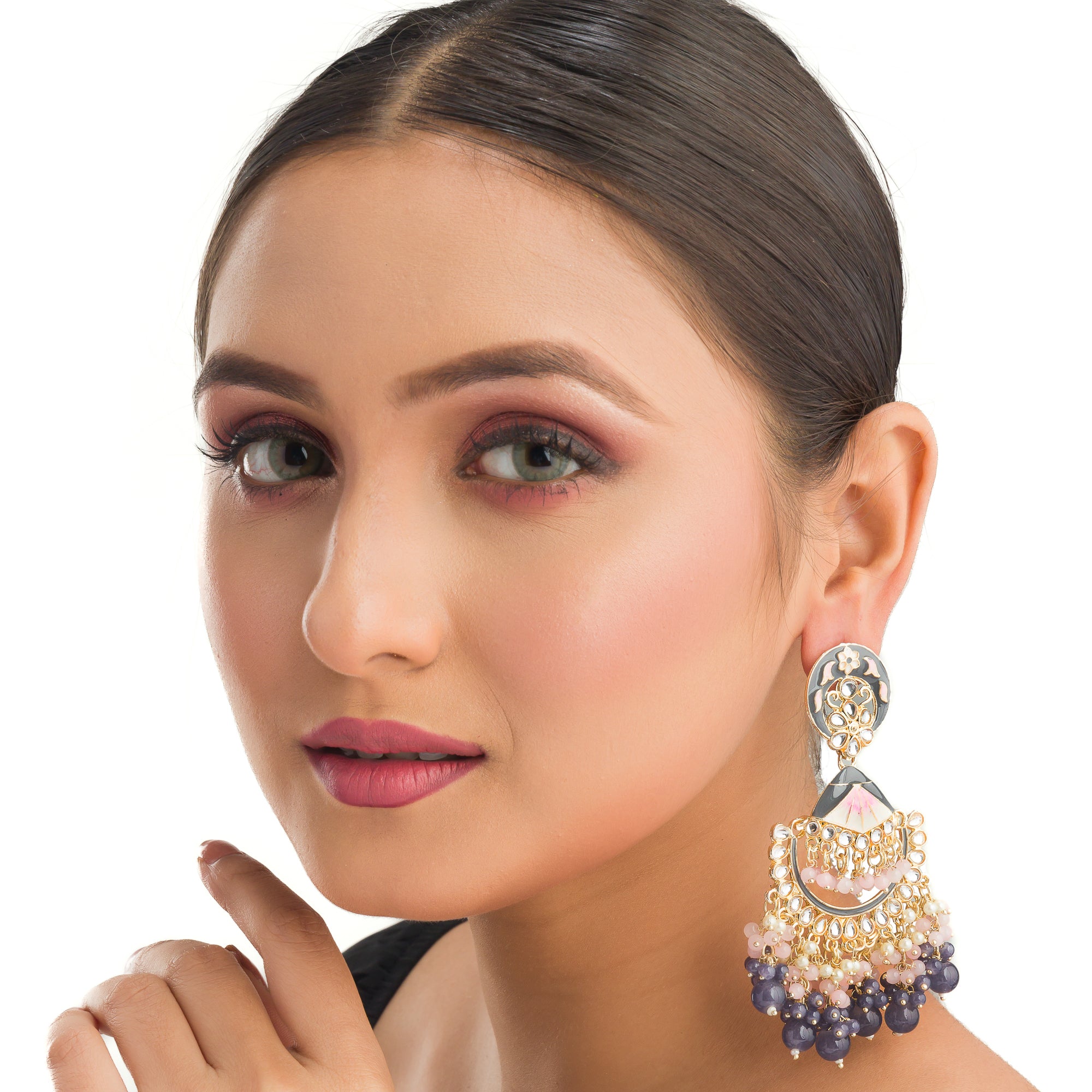 "Pink and white zircon jhumkas blend vibrant color with timeless elegance for a stunning look."