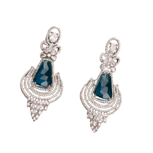 "Teal zircon earrings offer a striking, vibrant look with a touch of elegance."