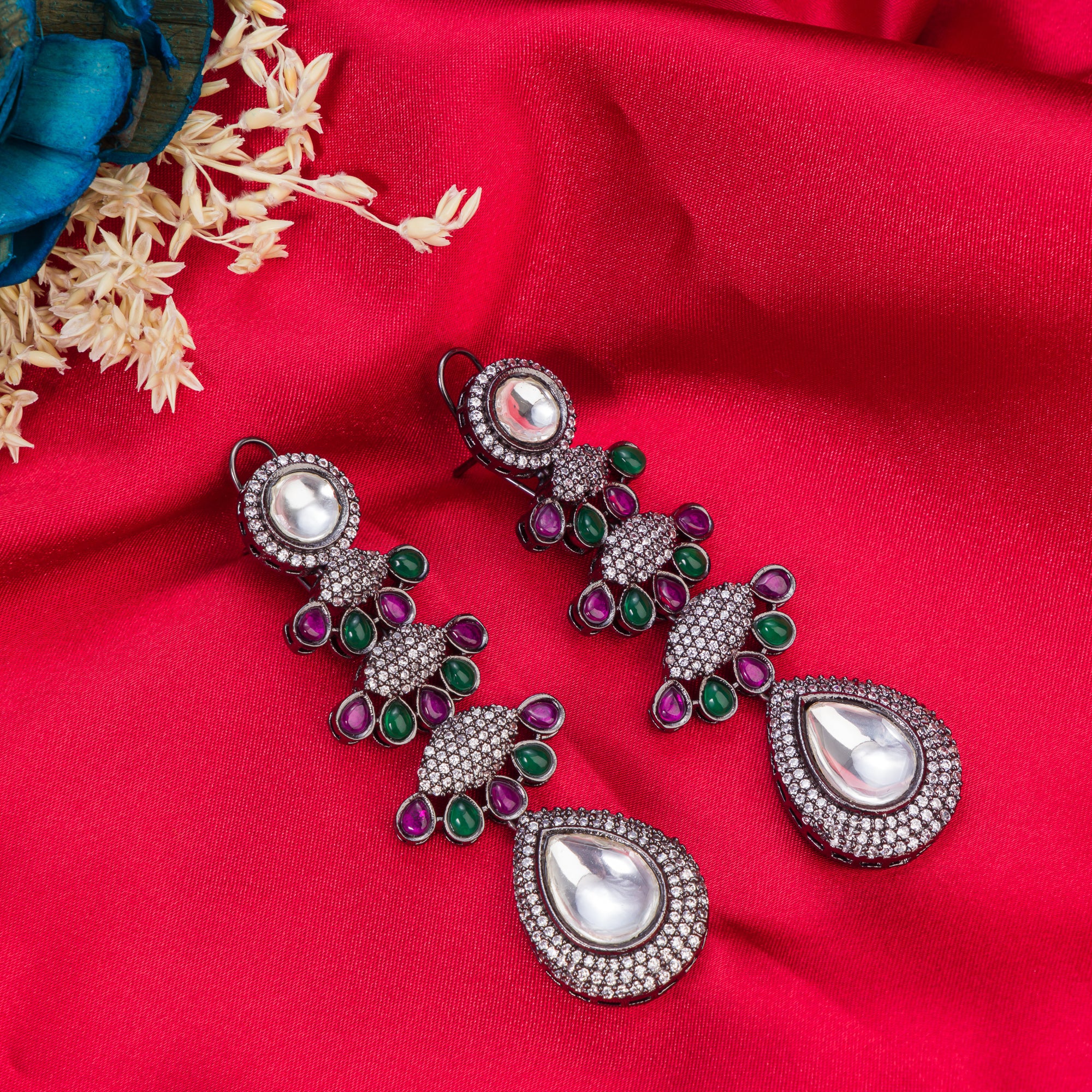 "Pink, white, and green zircon earrings offer a colorful, elegant sparkle for any look."