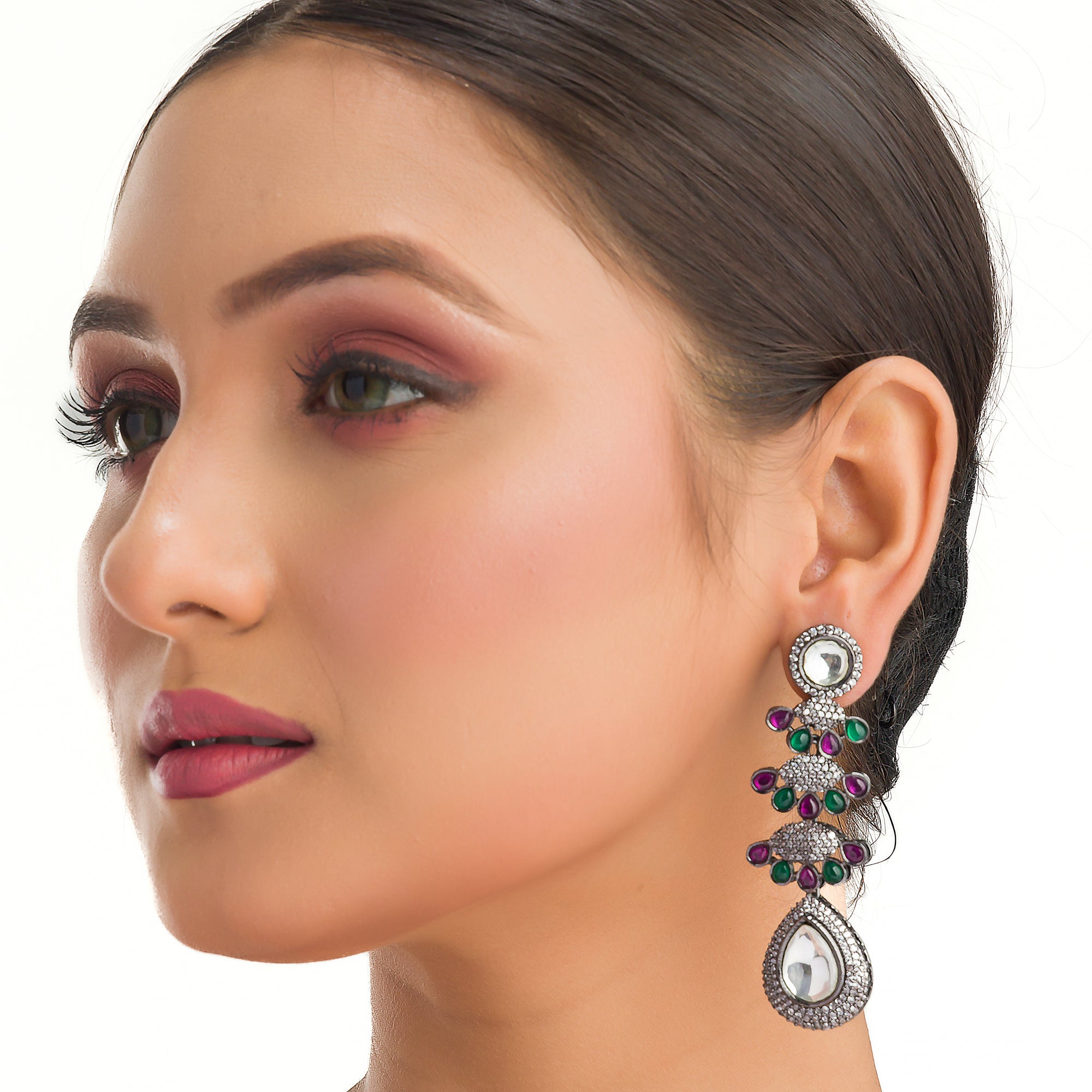 "Pink, white, and green zircon earrings offer a colorful, elegant sparkle for any look."