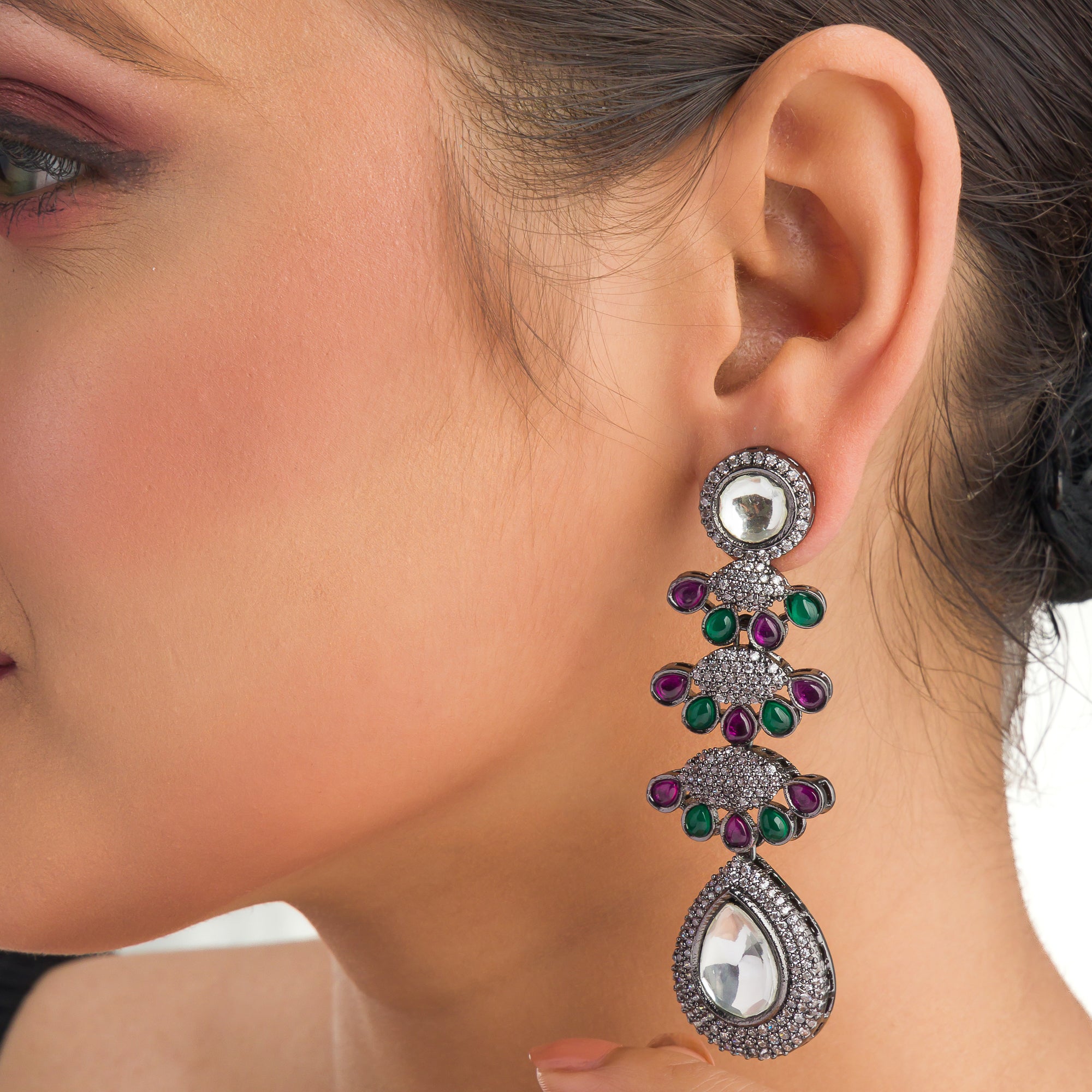 "Pink, white, and green zircon earrings offer a colorful, elegant sparkle for any look."