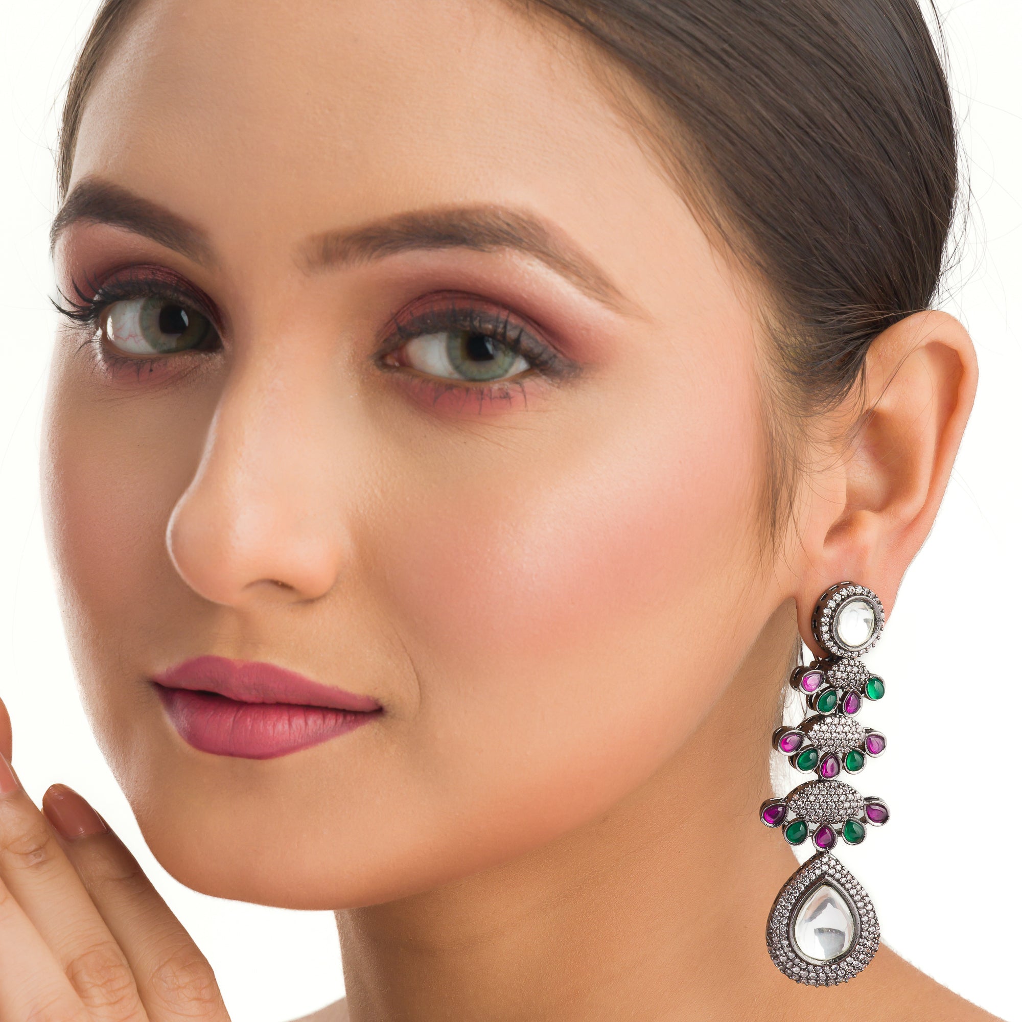 "Pink, white, and green zircon earrings offer a colorful, elegant sparkle for any look."