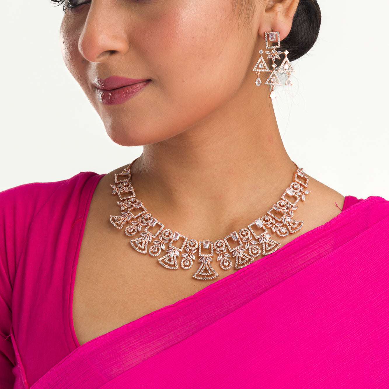 "Rose gold zircon necklace combines subtle shimmer with elegant tones."