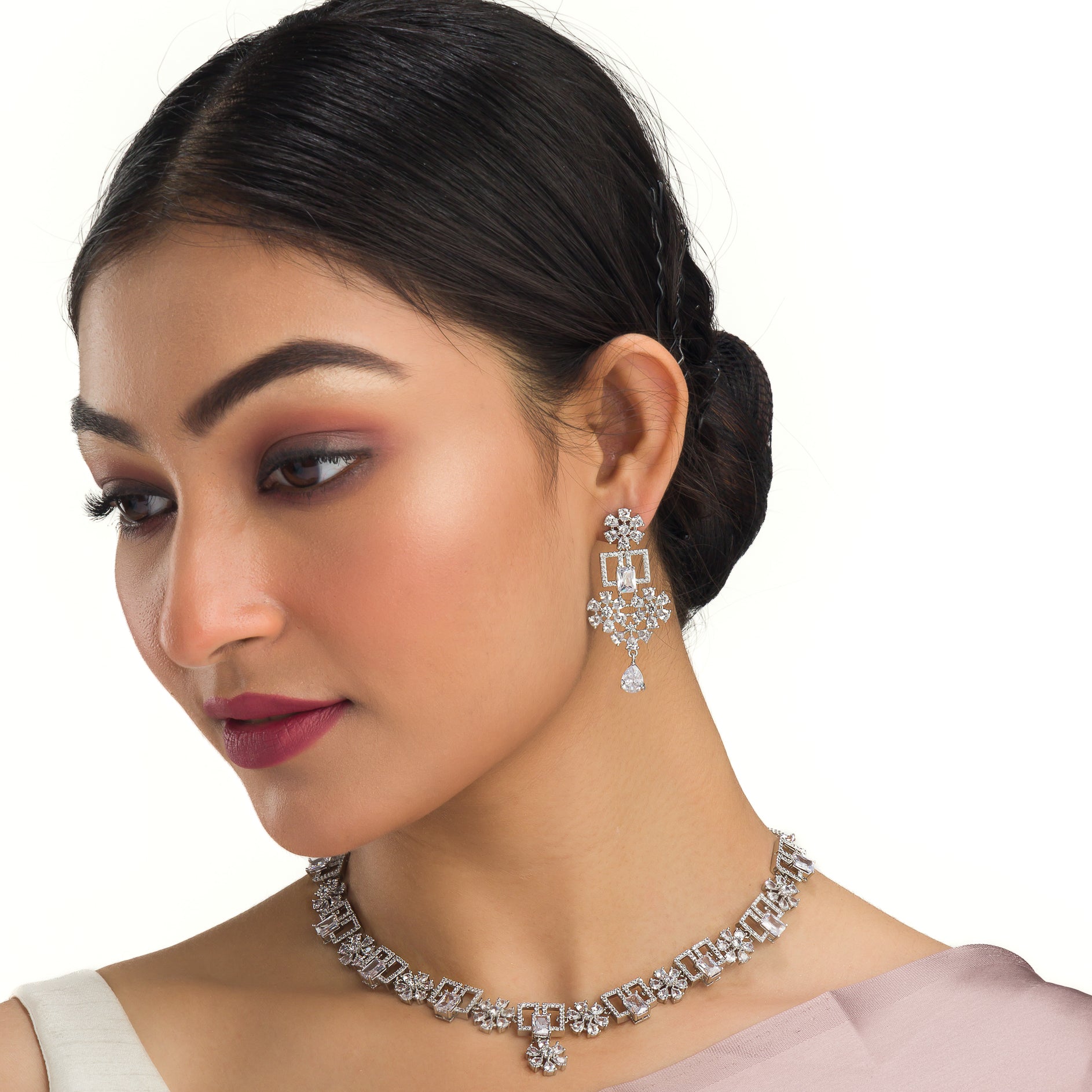 "Zircon heavy necklace with striking brilliance and bold elegance."