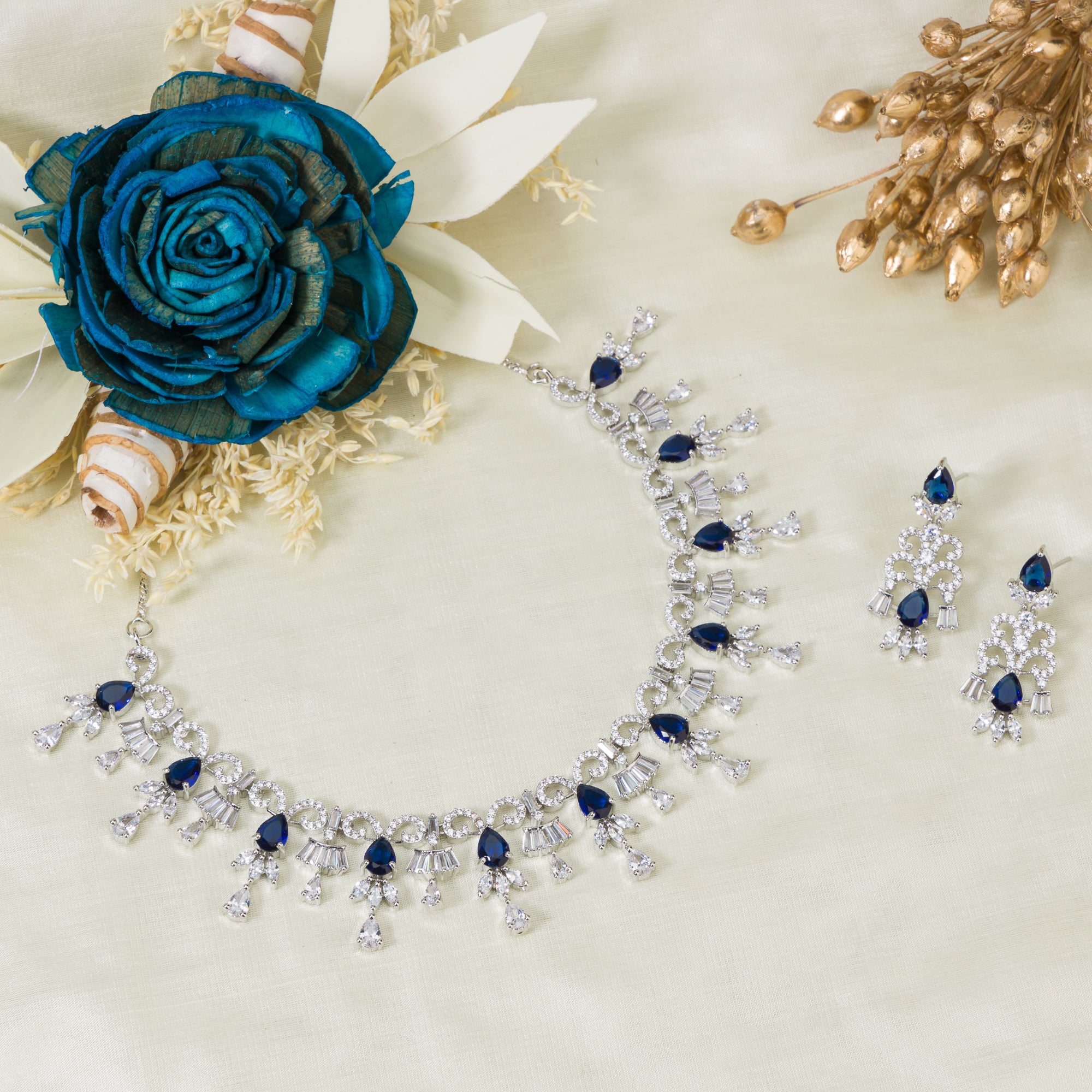 "Navy blue zircon necklace offers a sophisticated splash of color and sparkle."