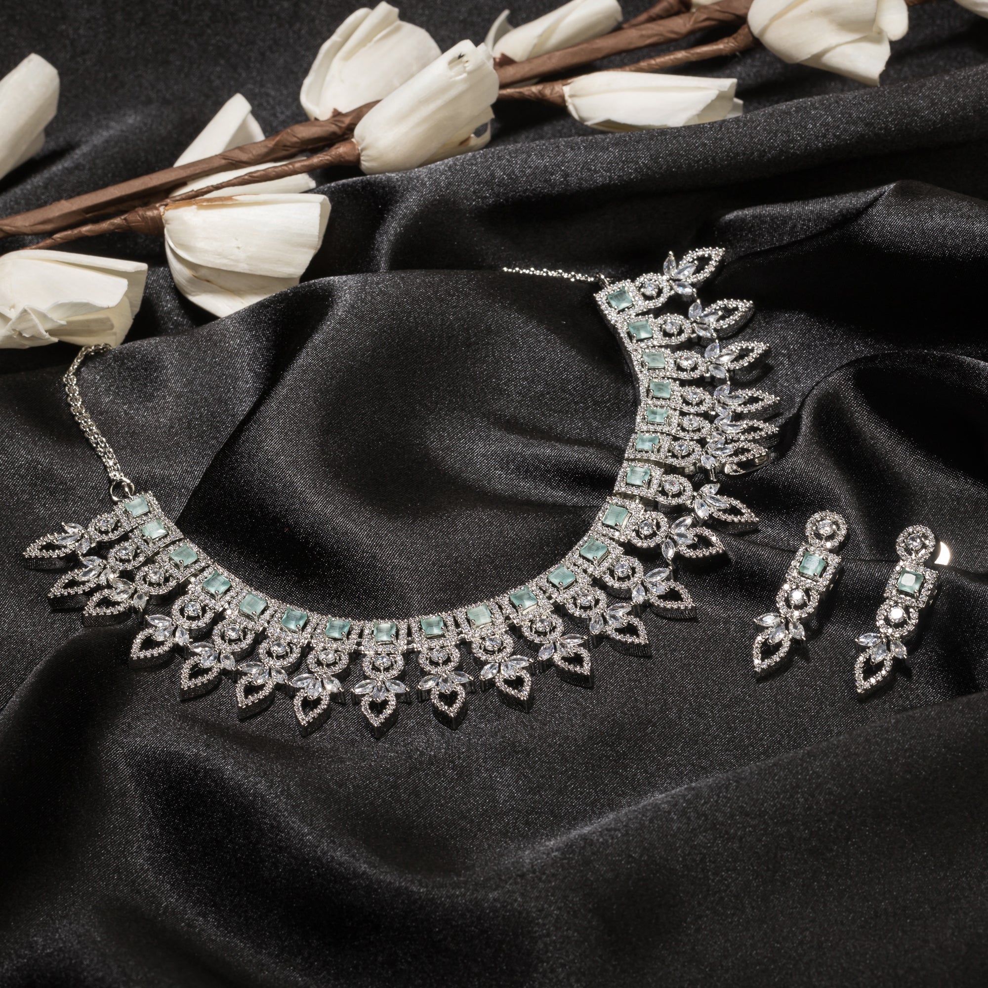 "Light green zircon necklace adds a fresh, subtle touch of elegance."