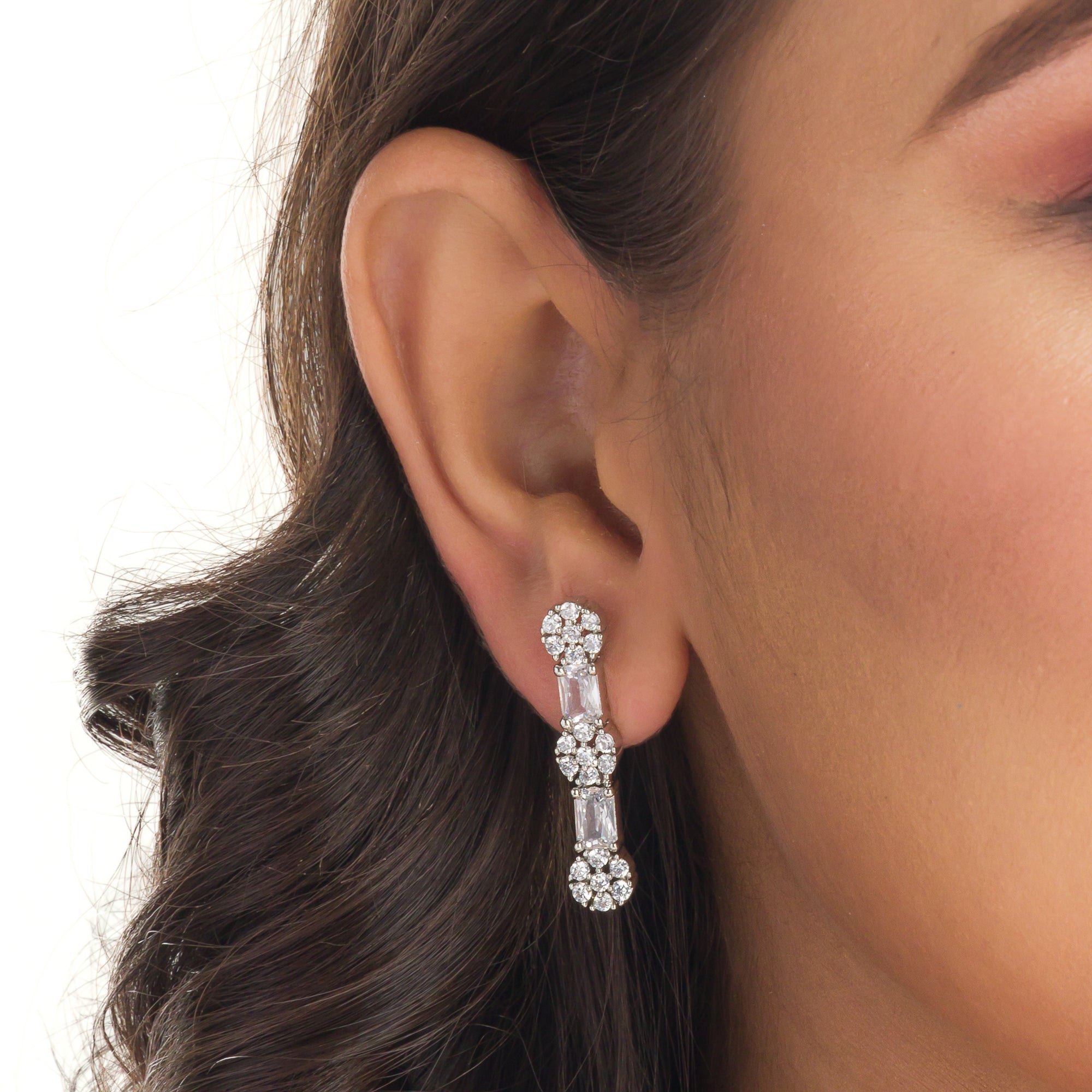 "Delicate zircon necklace with small flower design adds elegance and sparkle."