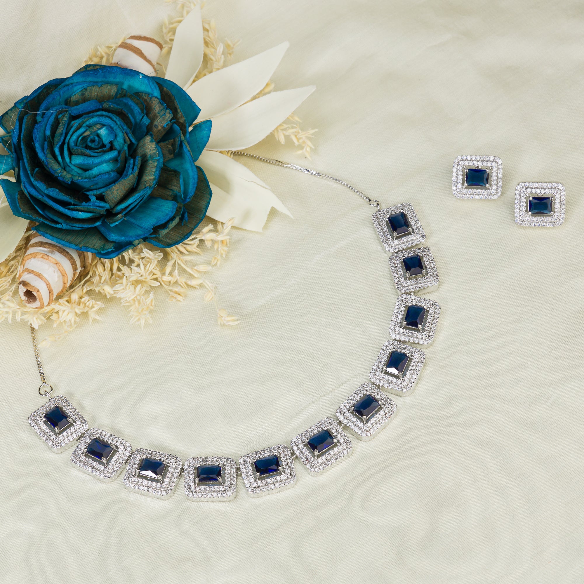 "Navy blue square zircon short necklace offers vibrant, chic elegance."