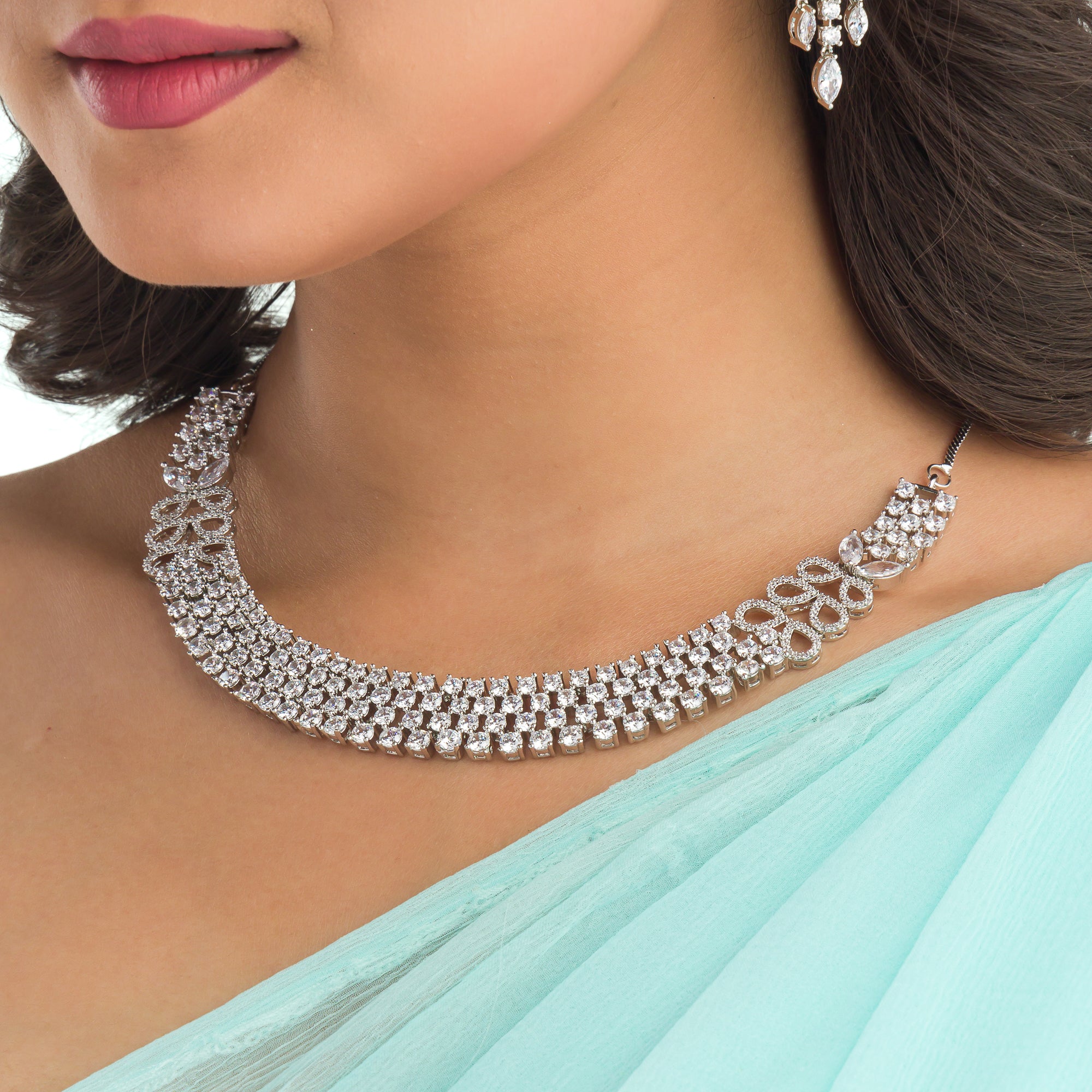"Zircon necklace with infinity design symbolizes timeless elegance."