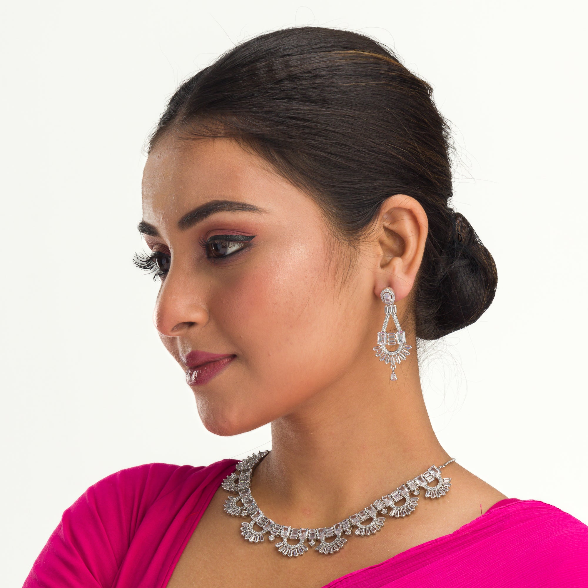 "Zircon necklace with infinity design symbolizes timeless elegance."