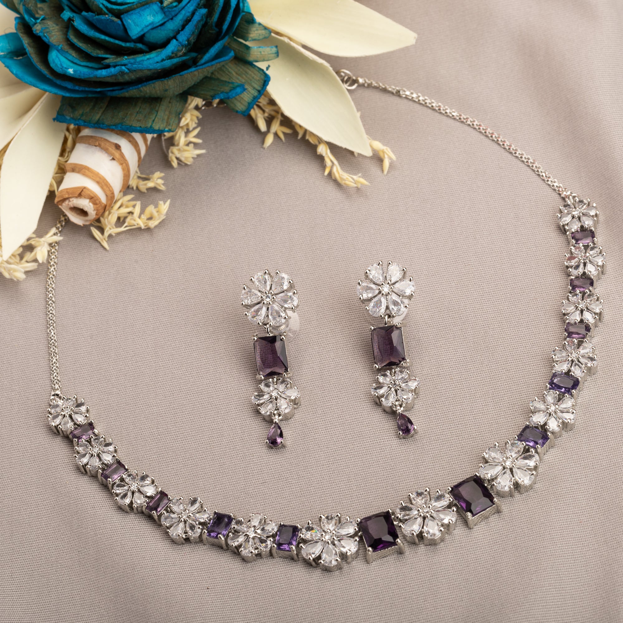 "Navy blue zircon short necklace delivers a sophisticated splash of color and sparkle."