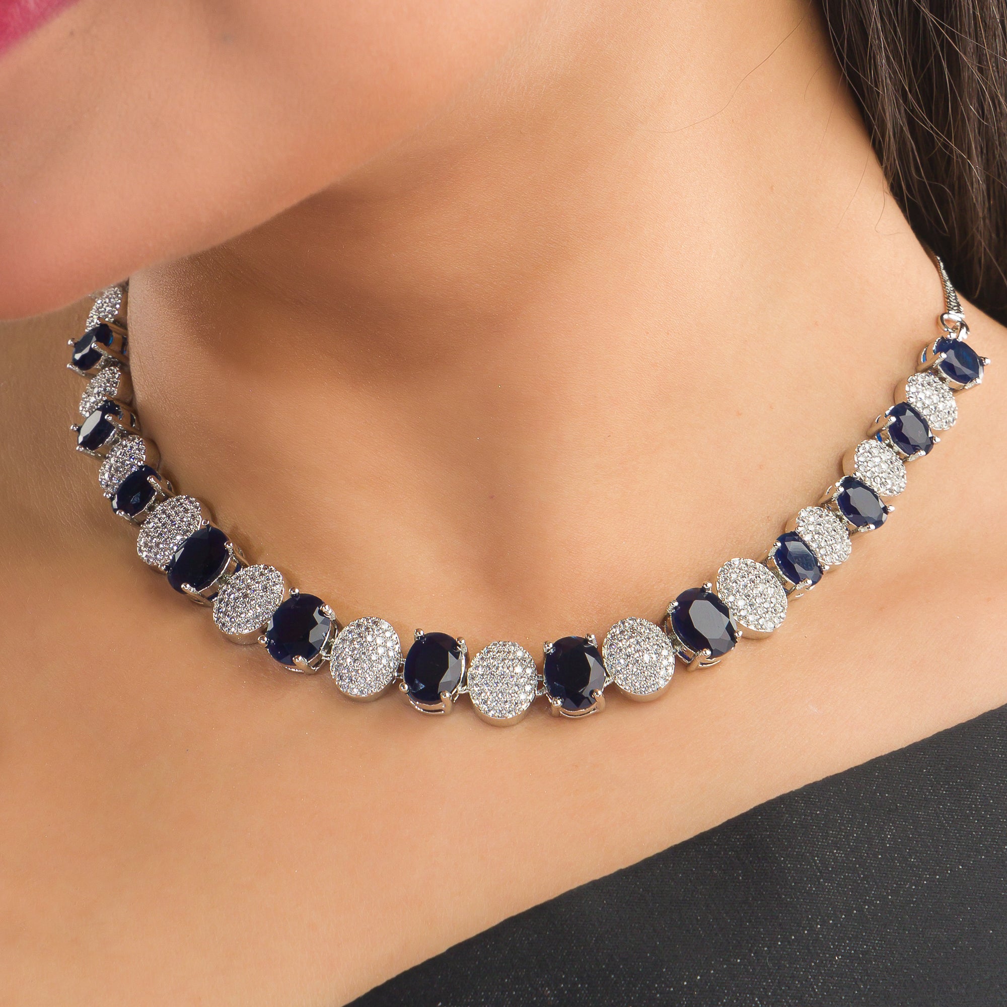 Navy blue zircon short necklace delivers a sophisticated splash of color and sparkle."
