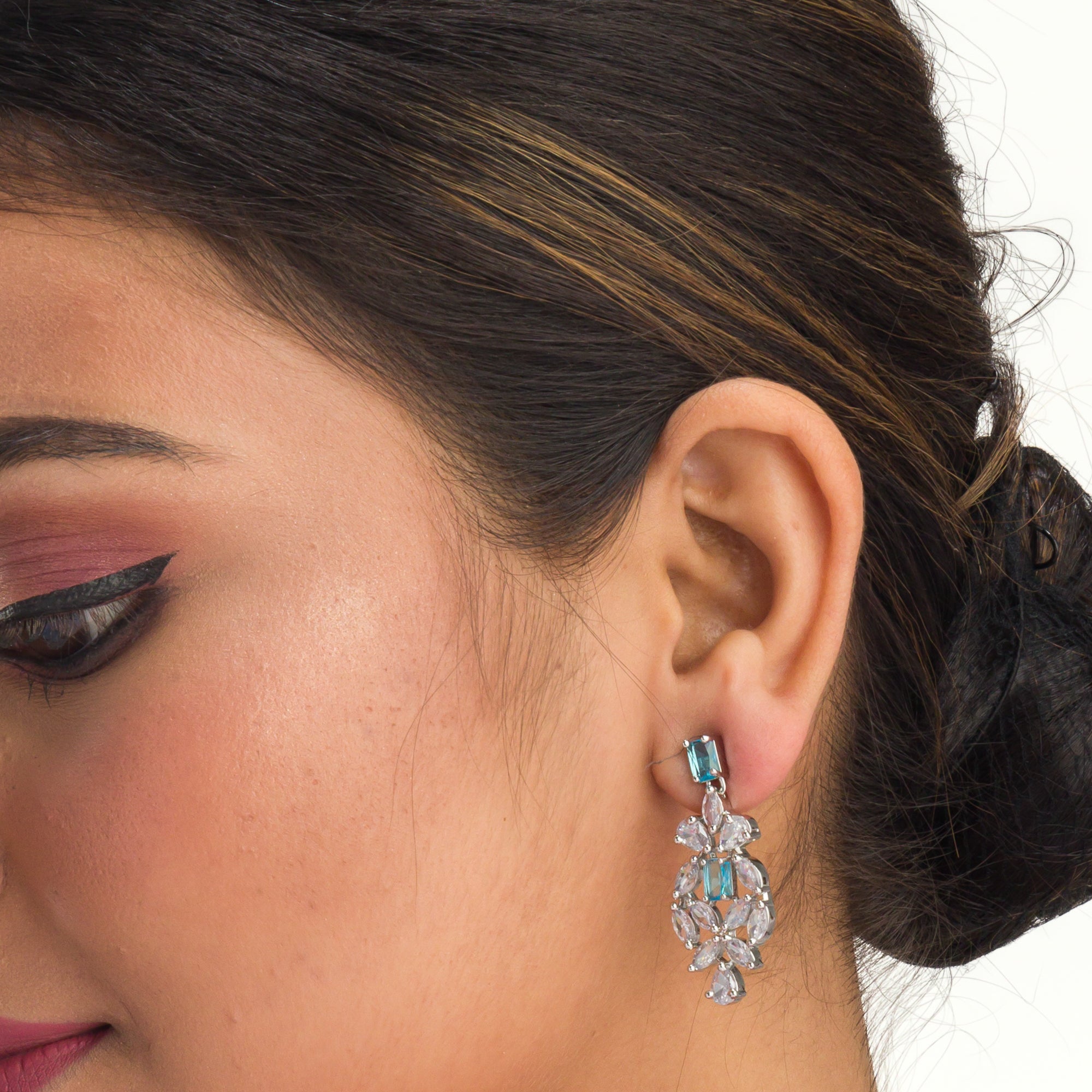 "Aqua blue zircon necklace with square stone offers a vibrant, stylish touch."