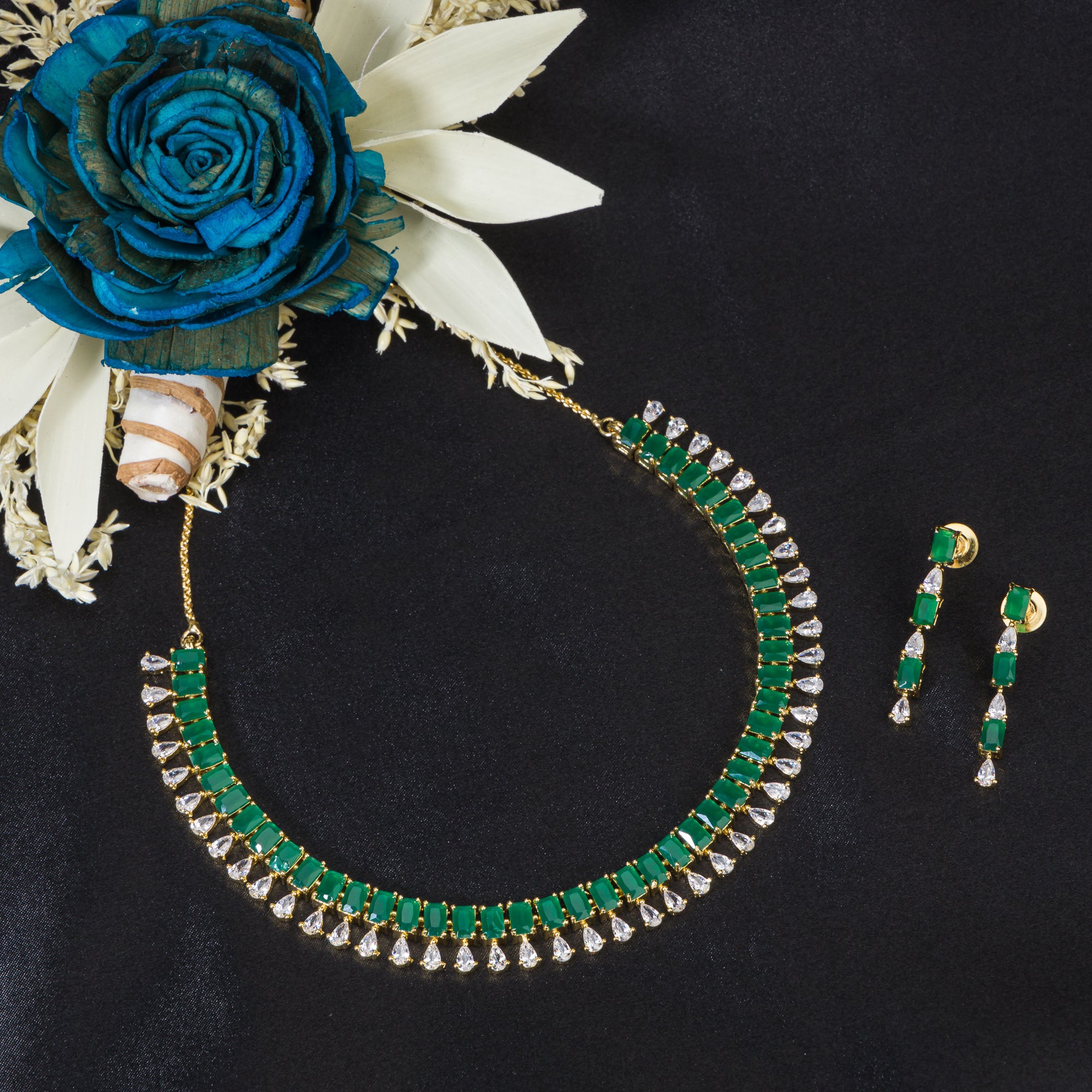 "Elegant green zircon necklace offers a vibrant splash of color and brilliance."