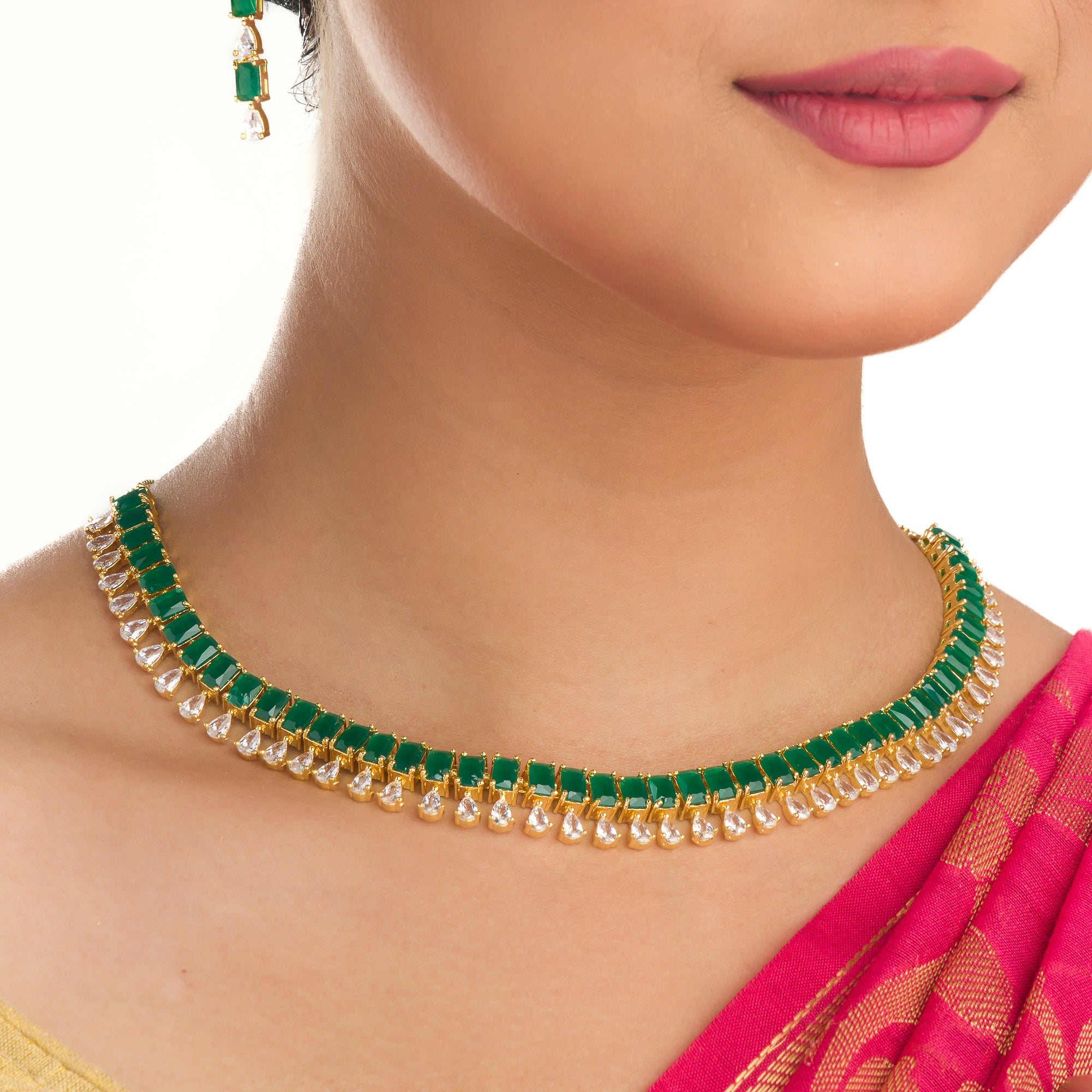 "Elegant green zircon necklace offers a vibrant splash of color and brilliance."