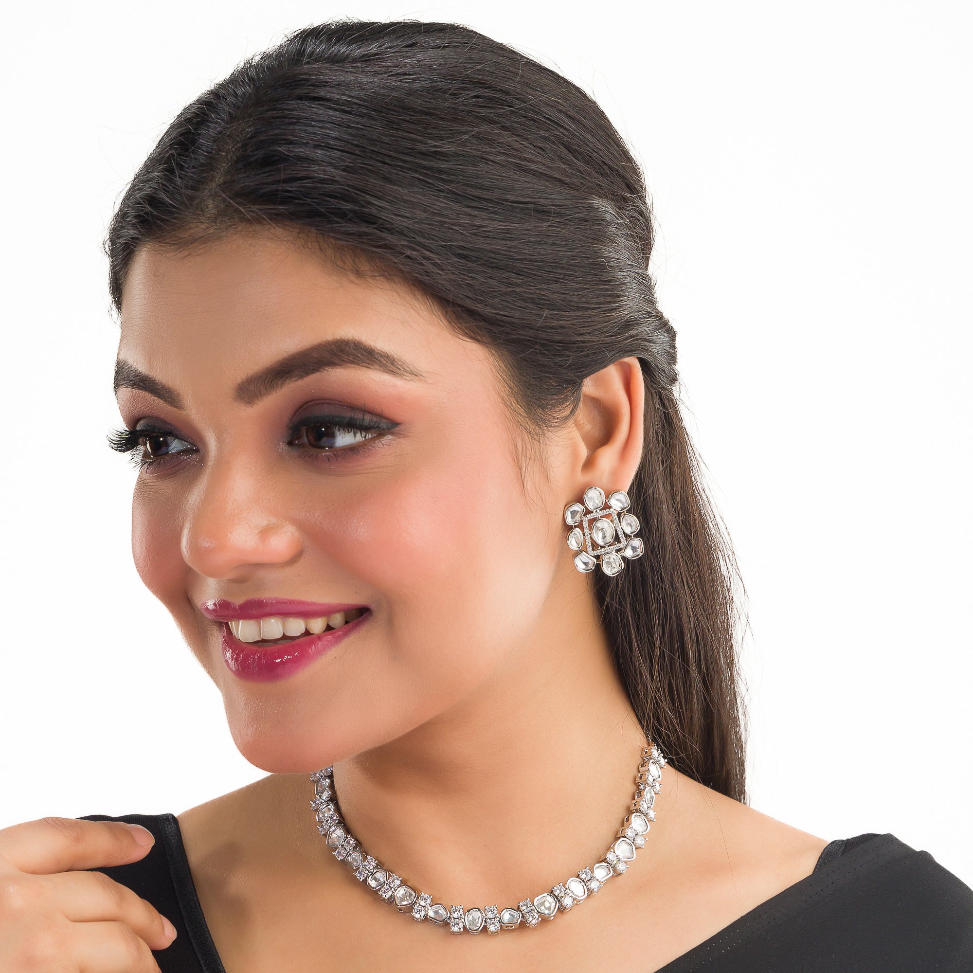 "Understated zircon necklace offers classic elegance and sparkle."