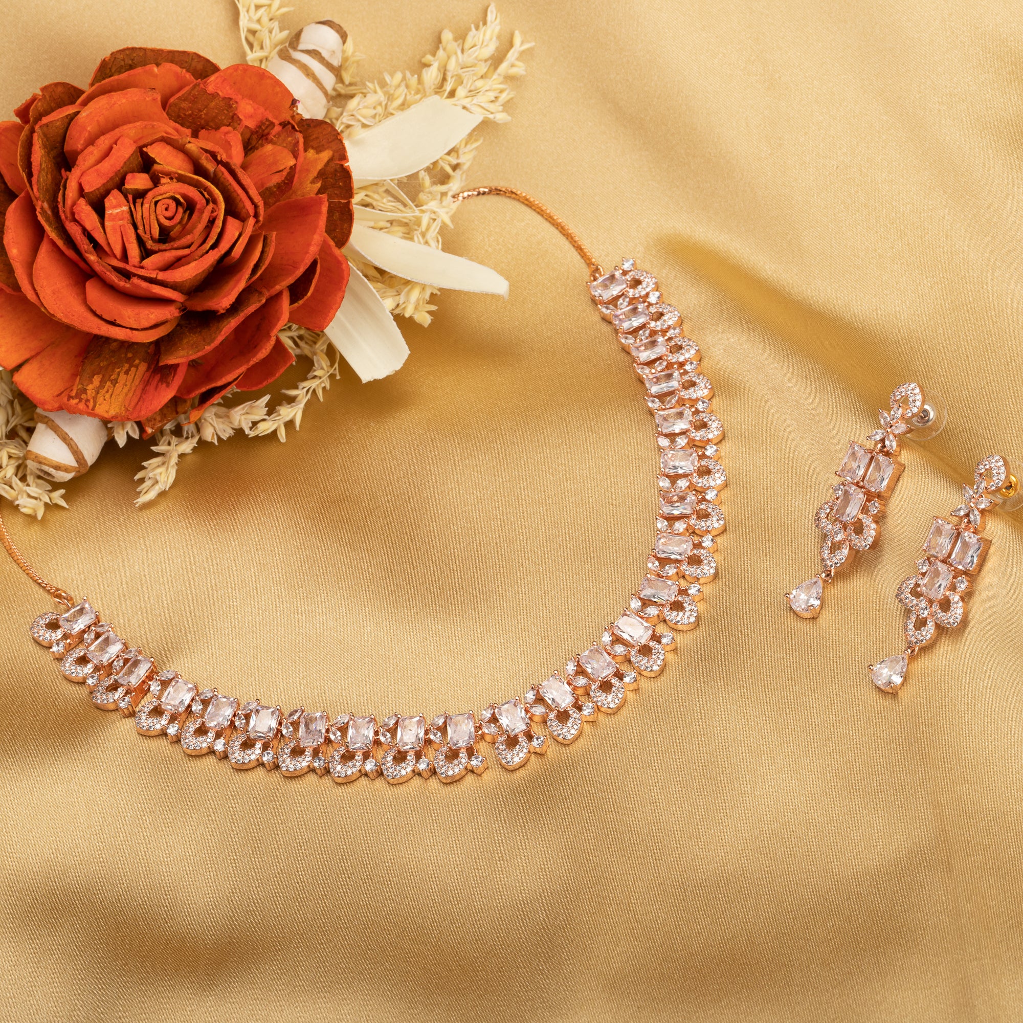 "Understated zircon necklace in silver and rose gold adds timeless elegance."
