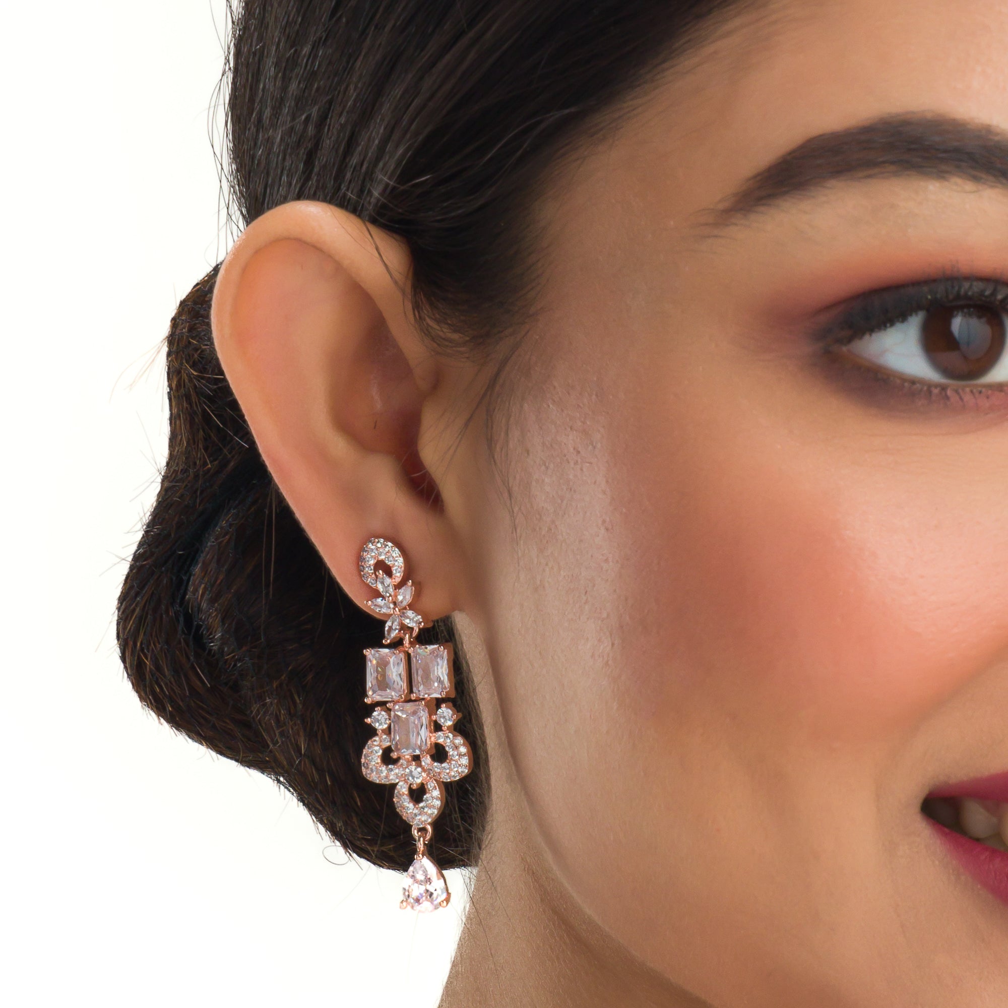 "Understated zircon necklace in silver and rose gold adds timeless elegance."