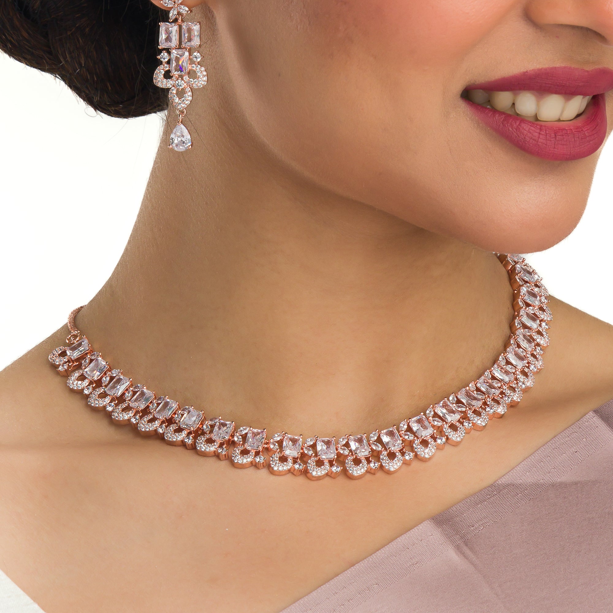 "Understated zircon necklace in silver and rose gold adds timeless elegance."
