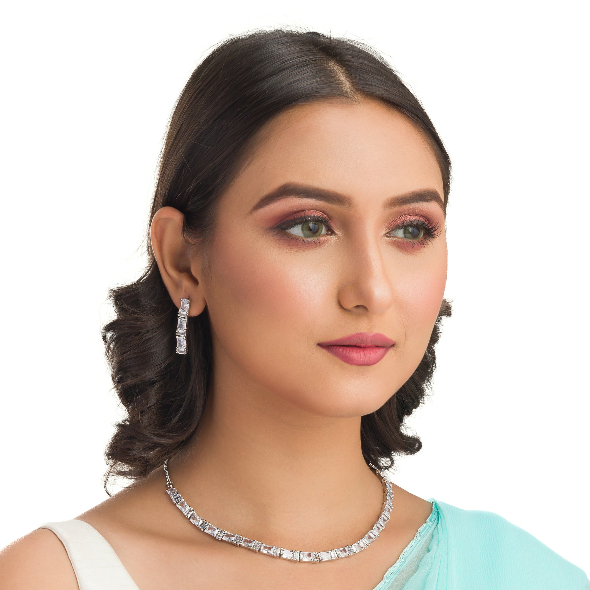 "Zircon necklace in silver offers a classic, understated elegance."