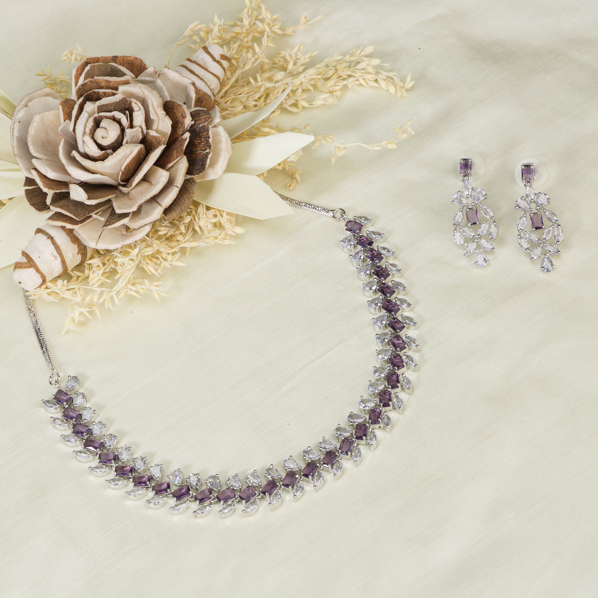 "Navy blue zircon necklace in rose gold offers deep, elegant allure and sophistication."