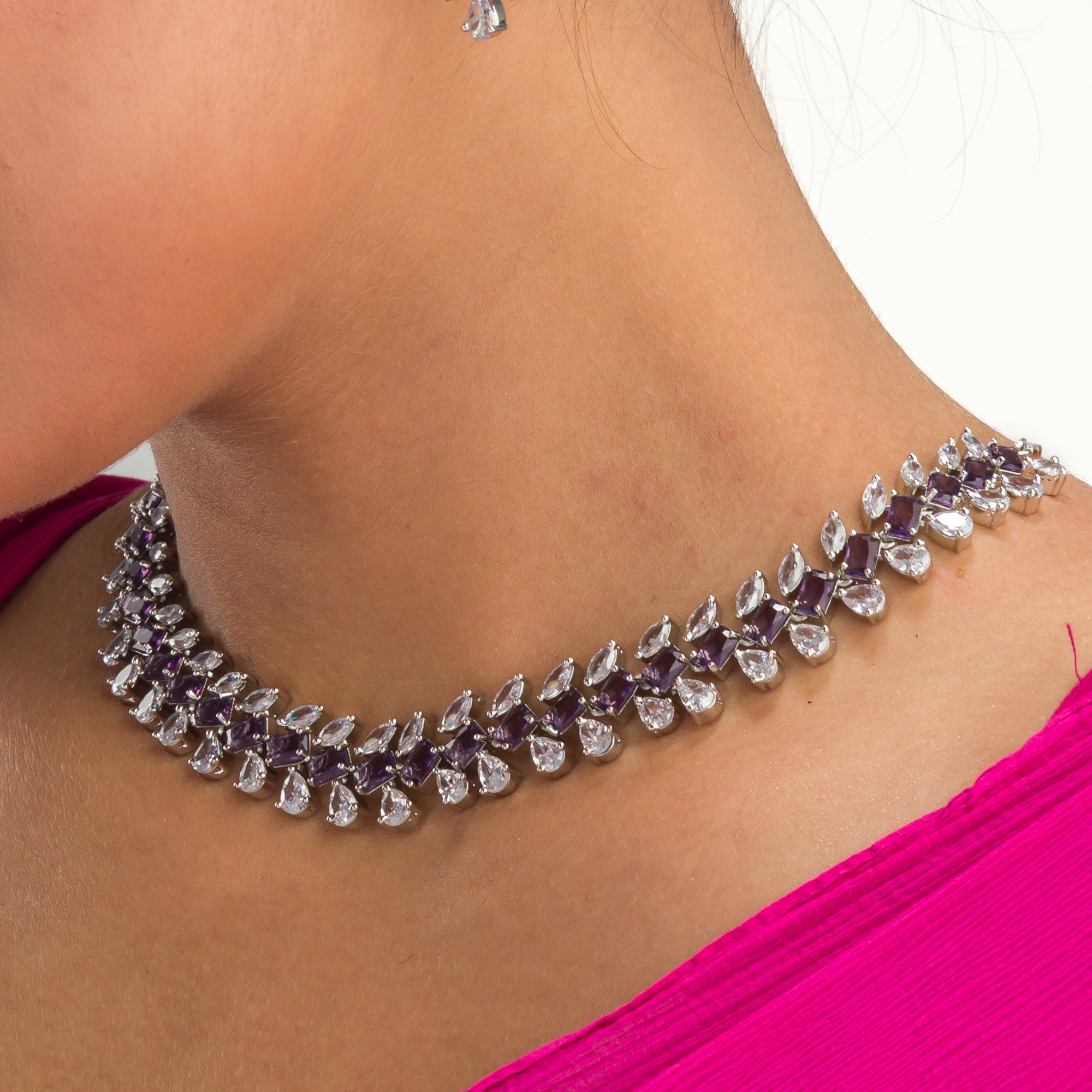 "Navy blue zircon necklace in rose gold offers deep, elegant allure and sophistication."