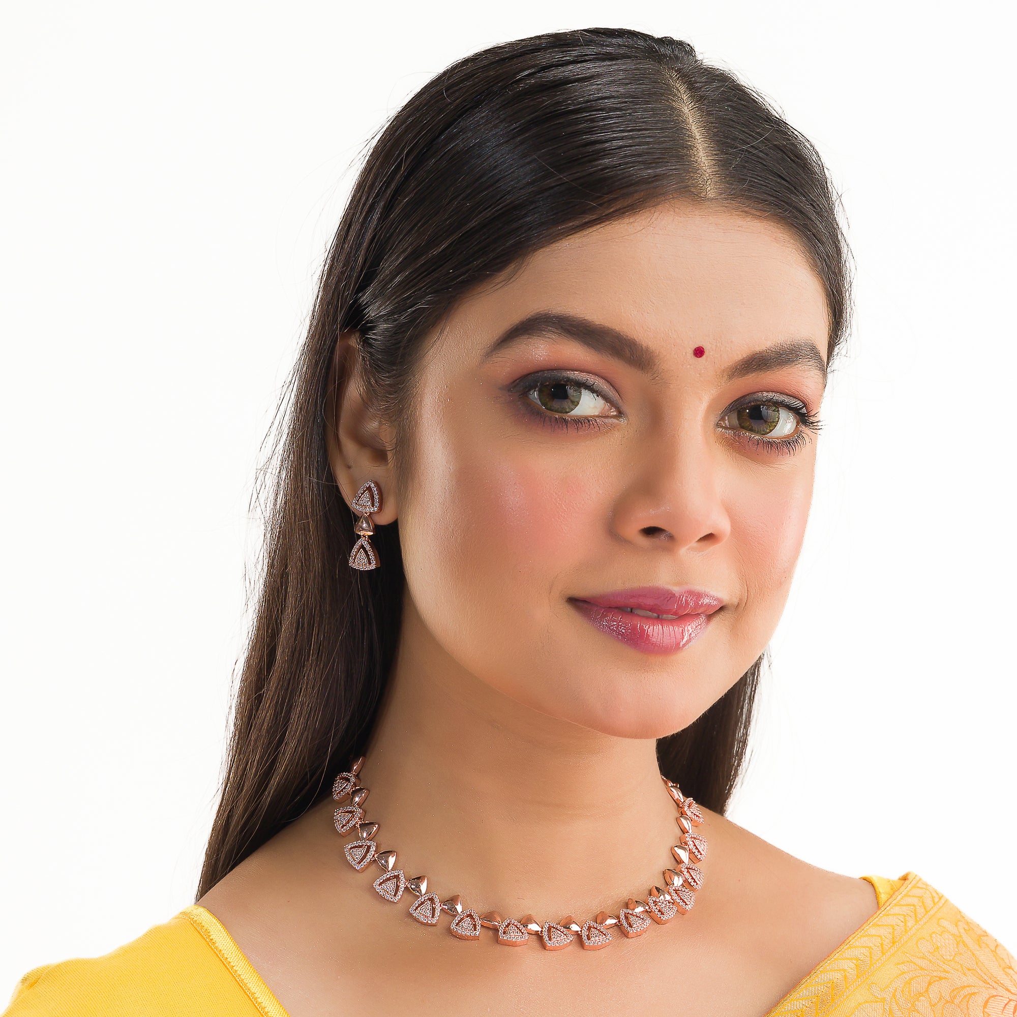 "Triangular rose gold zircon necklace adds sleek, modern sophistication to your look."