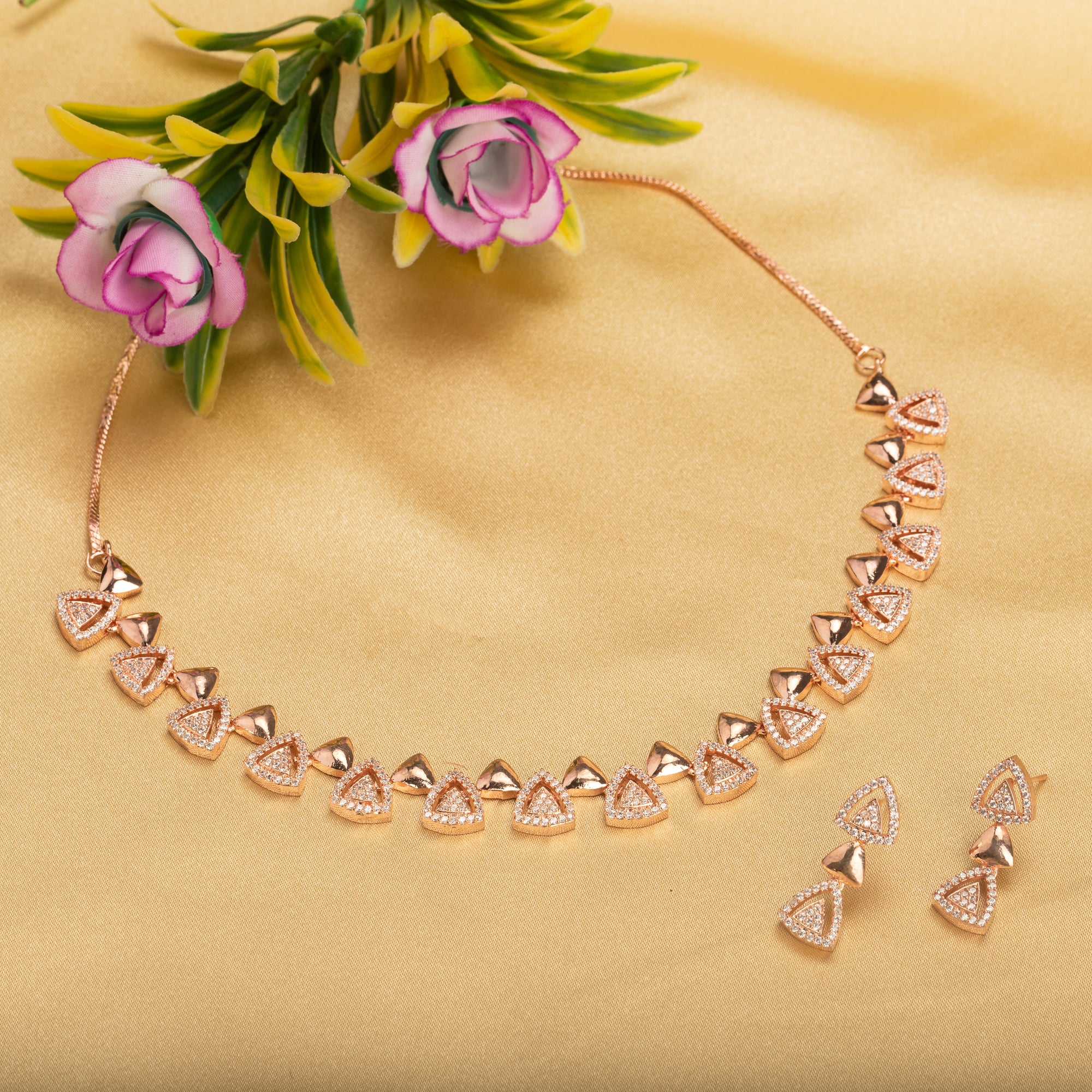 "Triangular rose gold zircon necklace adds sleek, modern sophistication to your look."