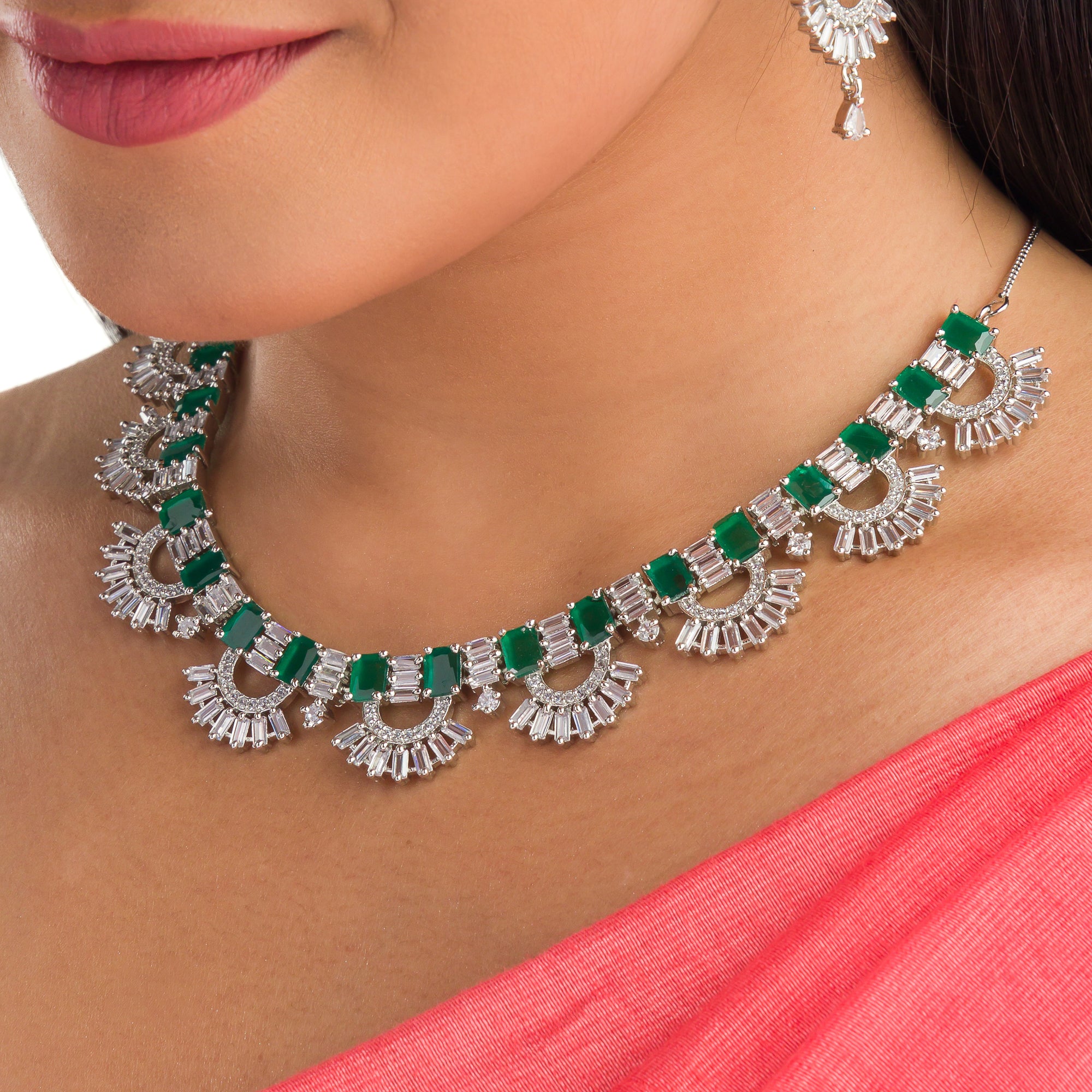 "Green and white zircon necklace in silver delivers a refined, striking elegance."