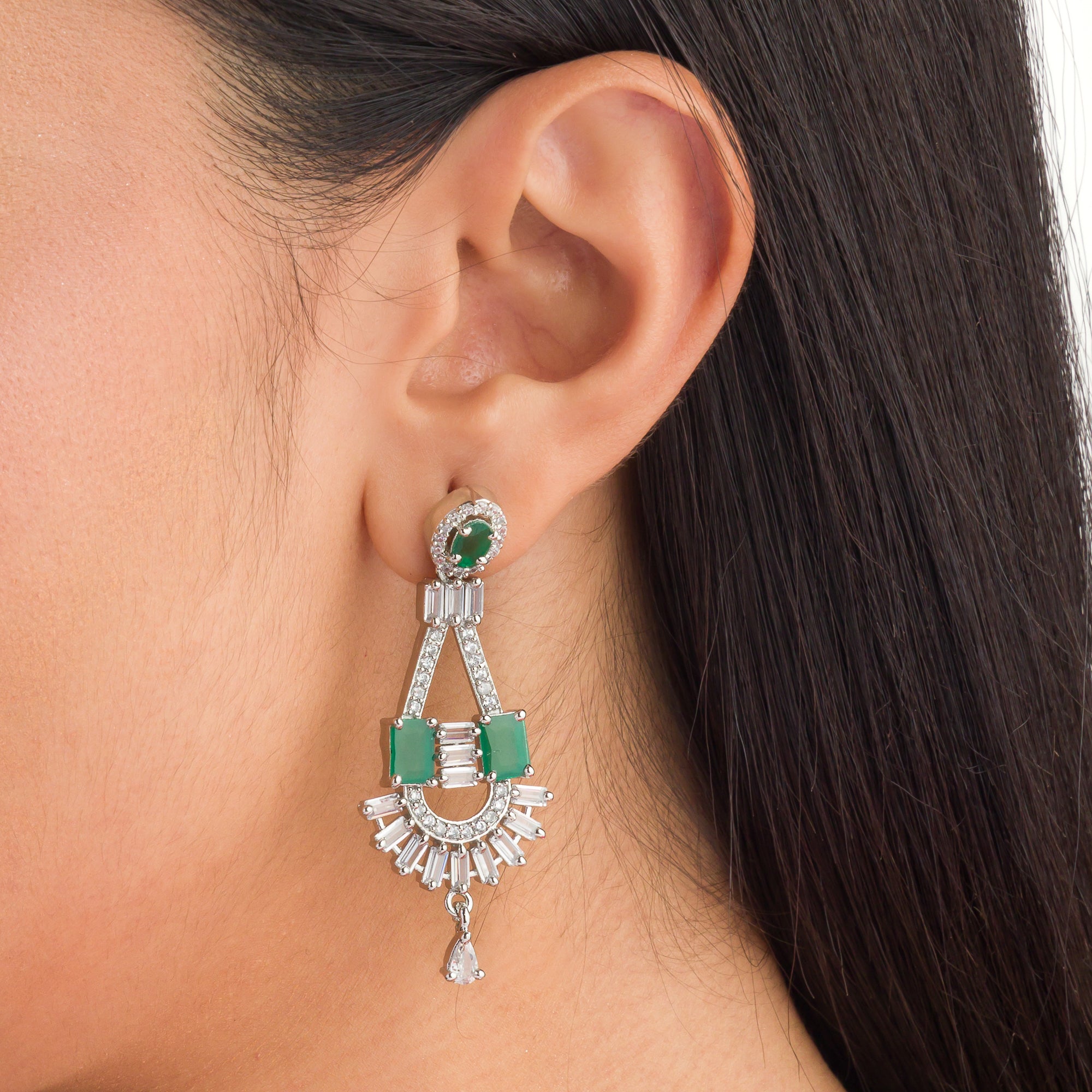 "Green and white zircon necklace in silver delivers a refined, striking elegance."