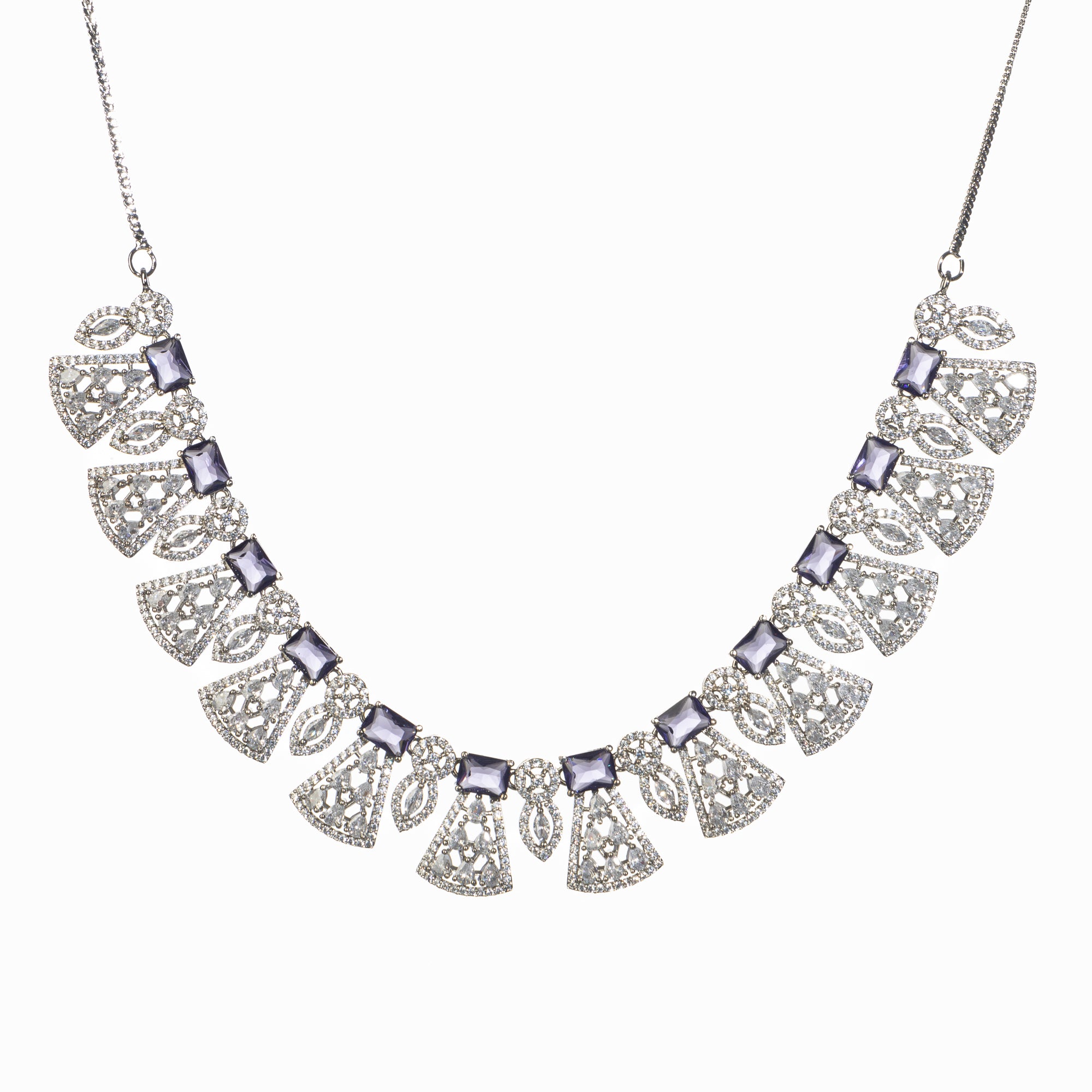 "Navy blue zircon necklace set with maang tikka exudes elegant coordination and style."