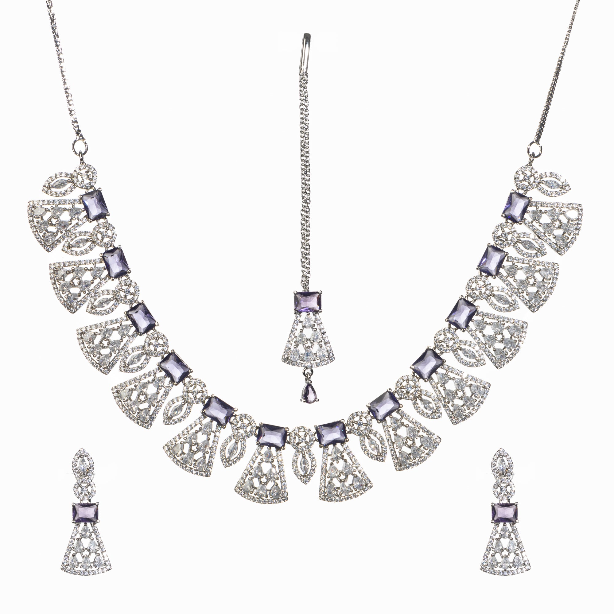 "Navy blue zircon necklace set with maang tikka exudes elegant coordination and style."