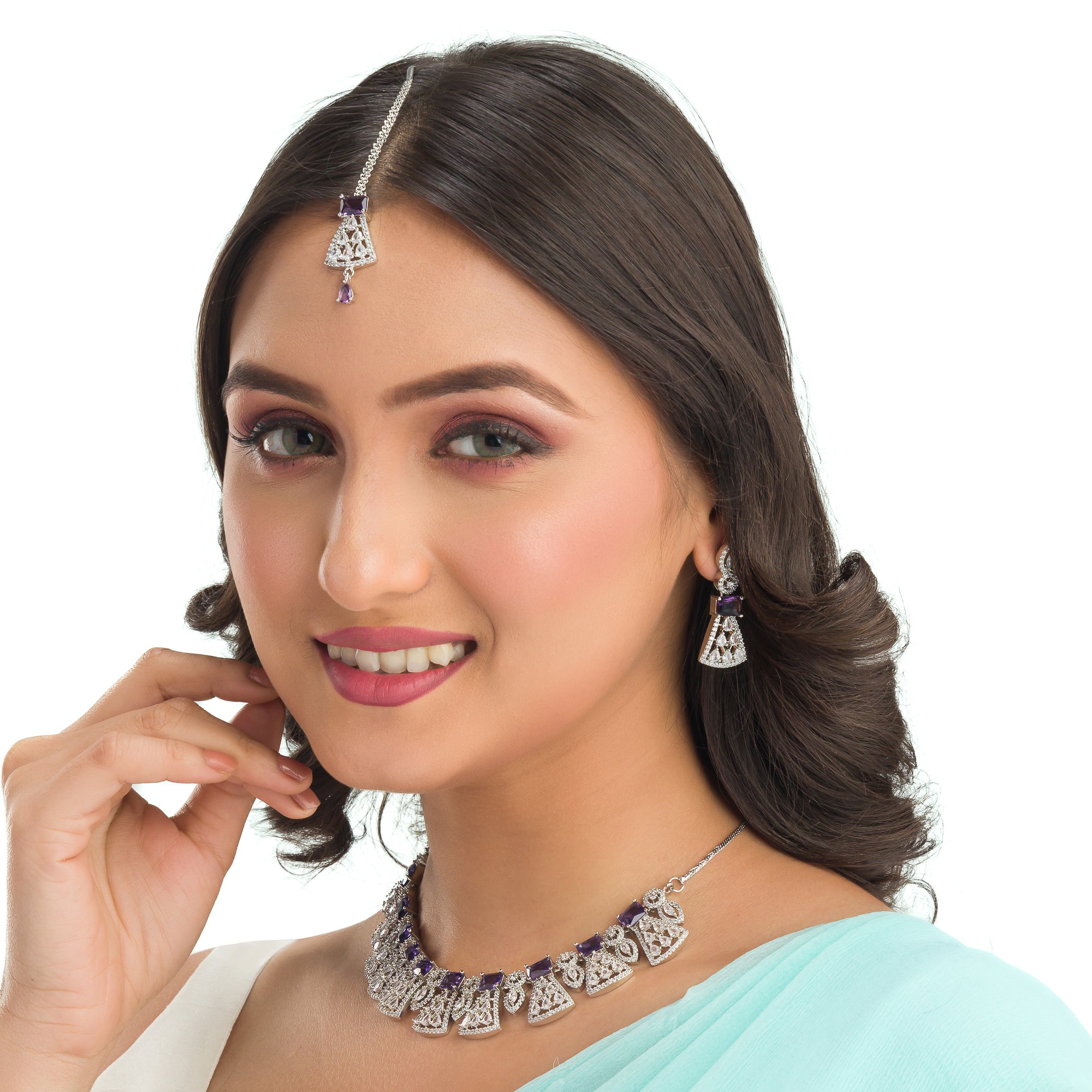 "Navy blue zircon necklace set with maang tikka exudes elegant coordination and style."