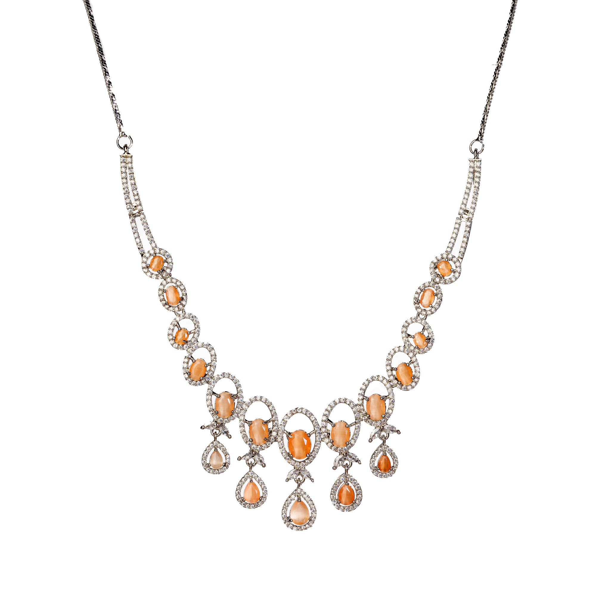 "Salmon zircon necklace with white zircons adds vibrant sparkle for a lively, chic look."