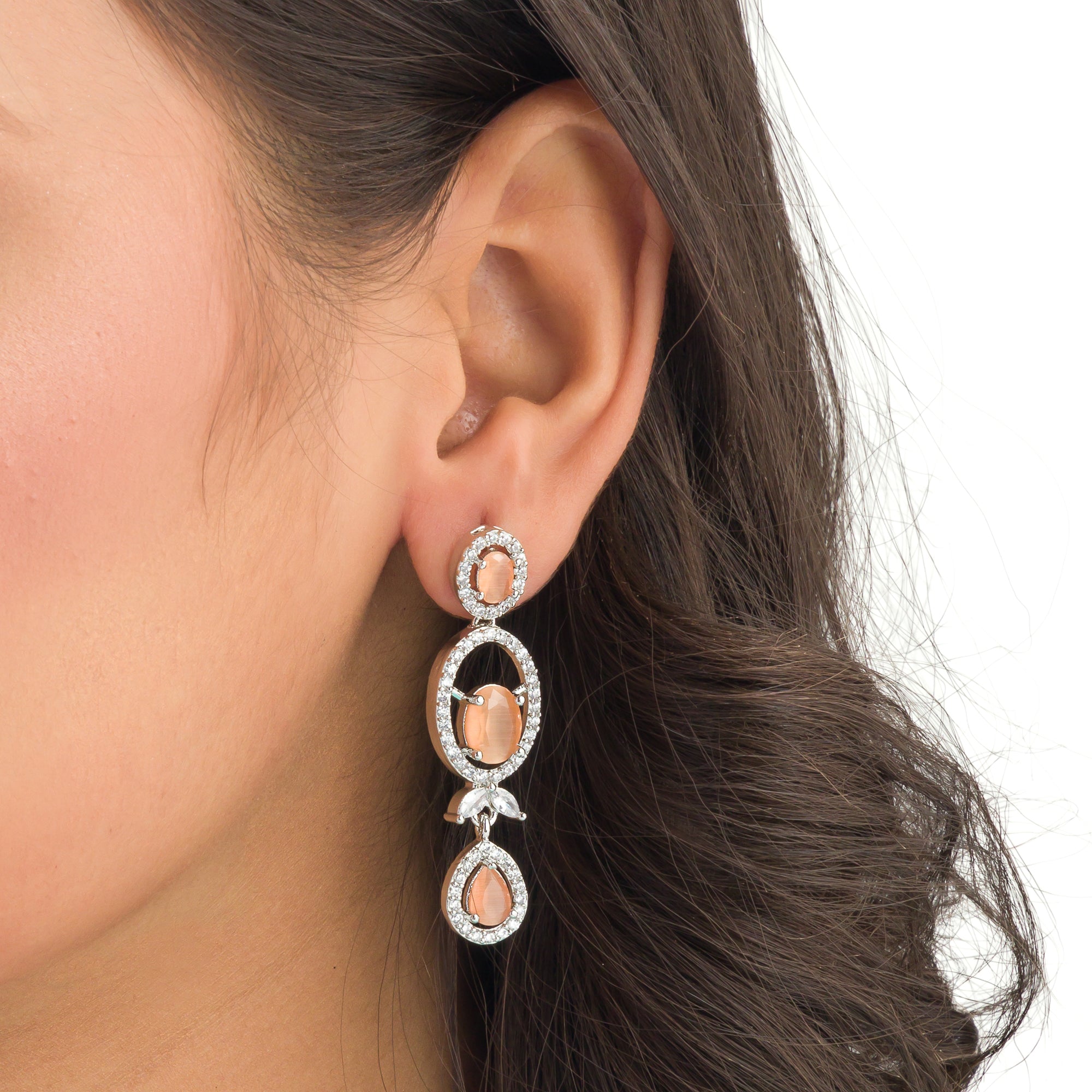 "Salmon zircon necklace with white zircons adds vibrant sparkle for a lively, chic look."