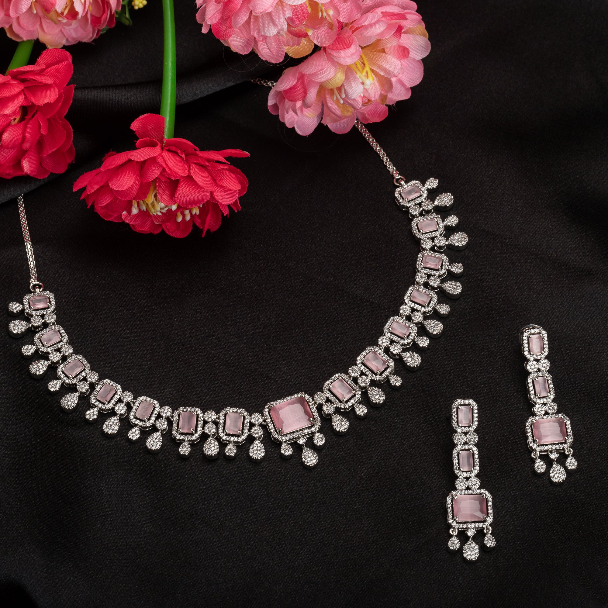 "Pink zircon necklace with square stone adds a bold, elegant touch to any outfit."
