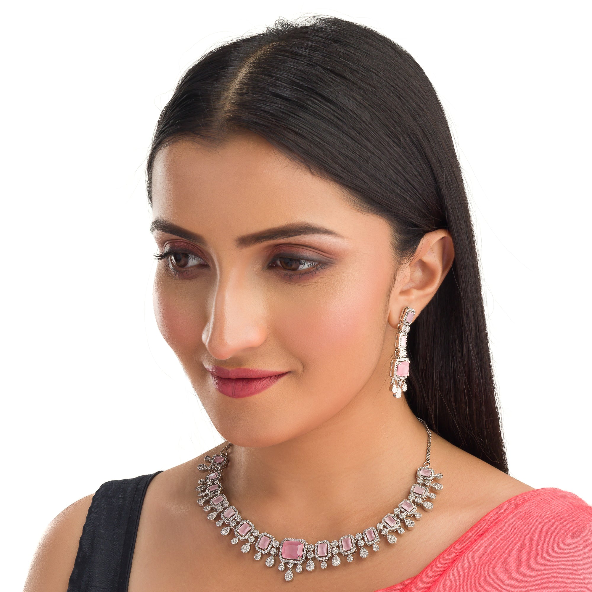 "Pink zircon necklace with square stone adds a bold, elegant touch to any outfit."