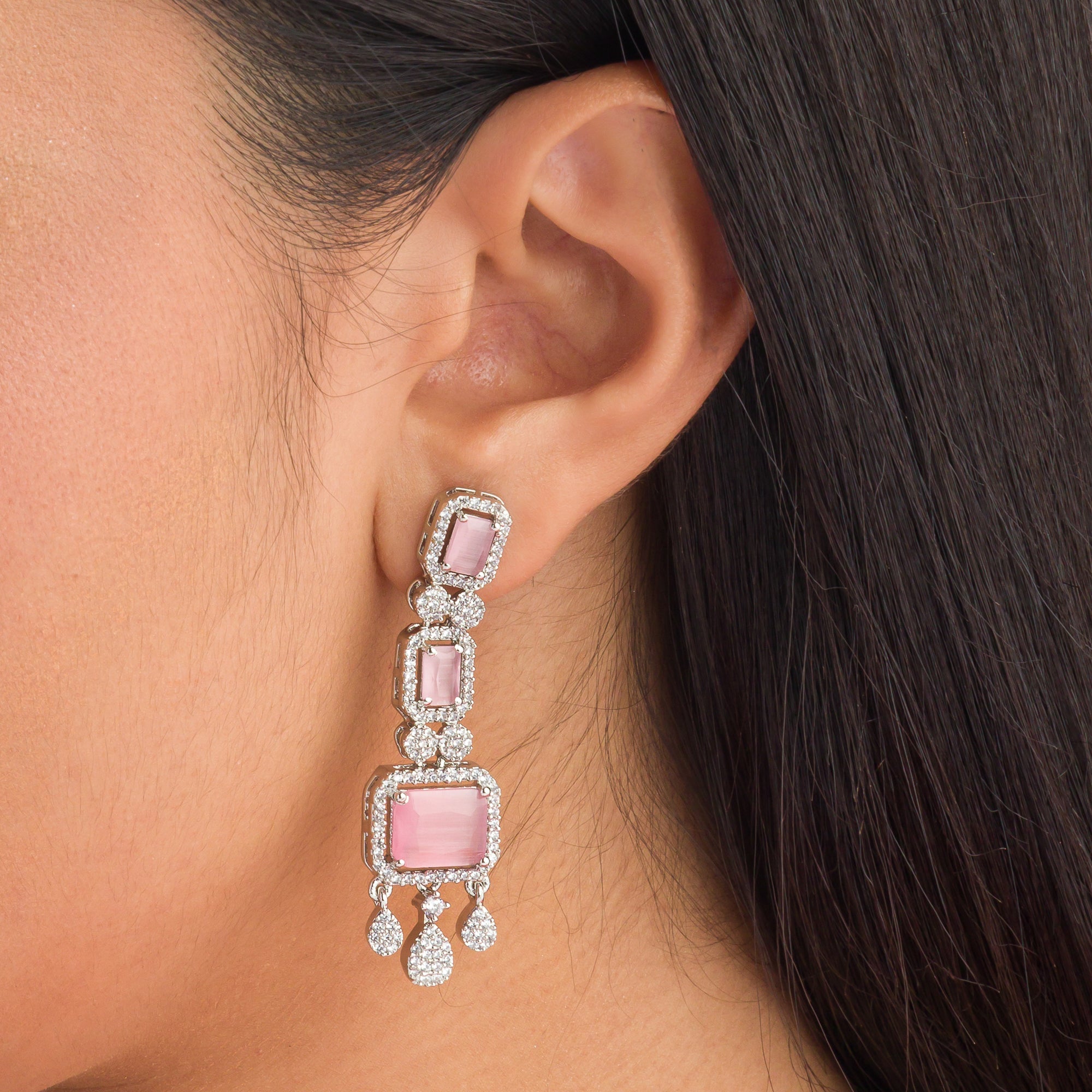 "Pink zircon necklace with square stone adds a bold, elegant touch to any outfit."