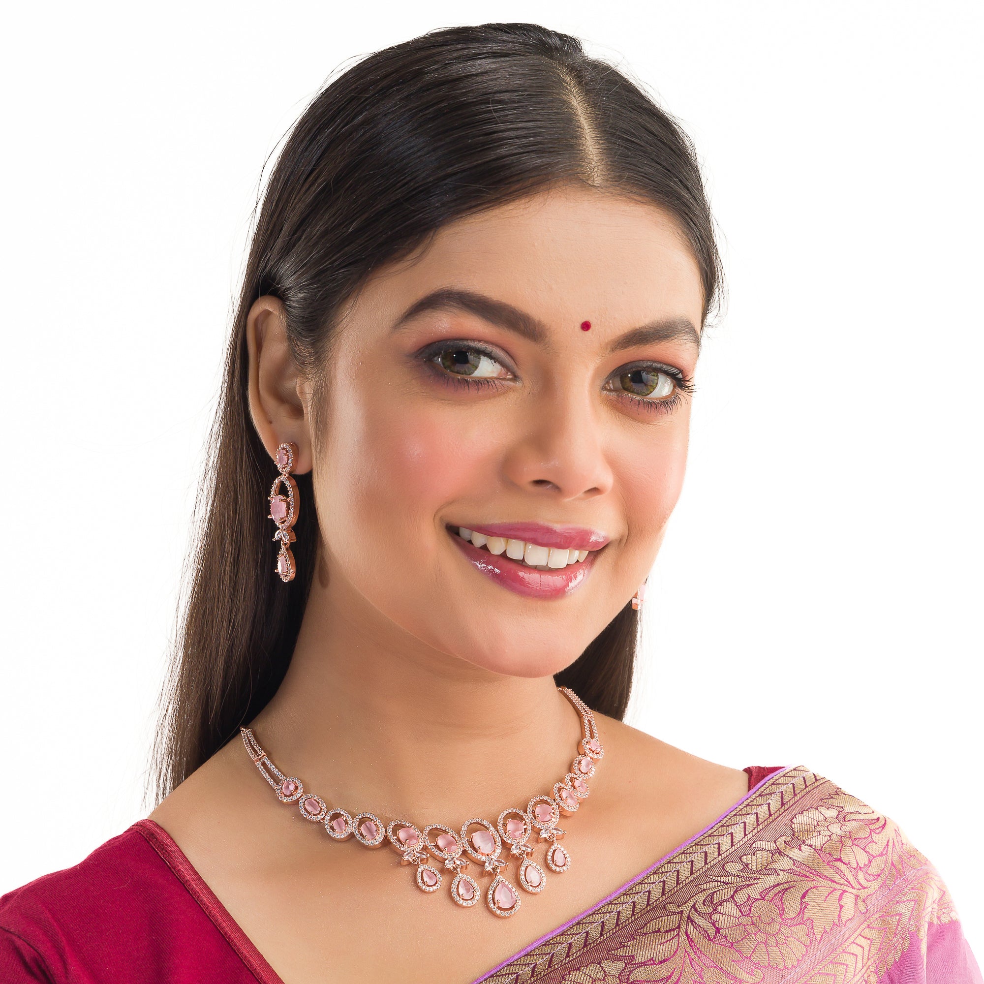 Pink zircon necklace with rose gold polish adds a chic and elegant finishing touch