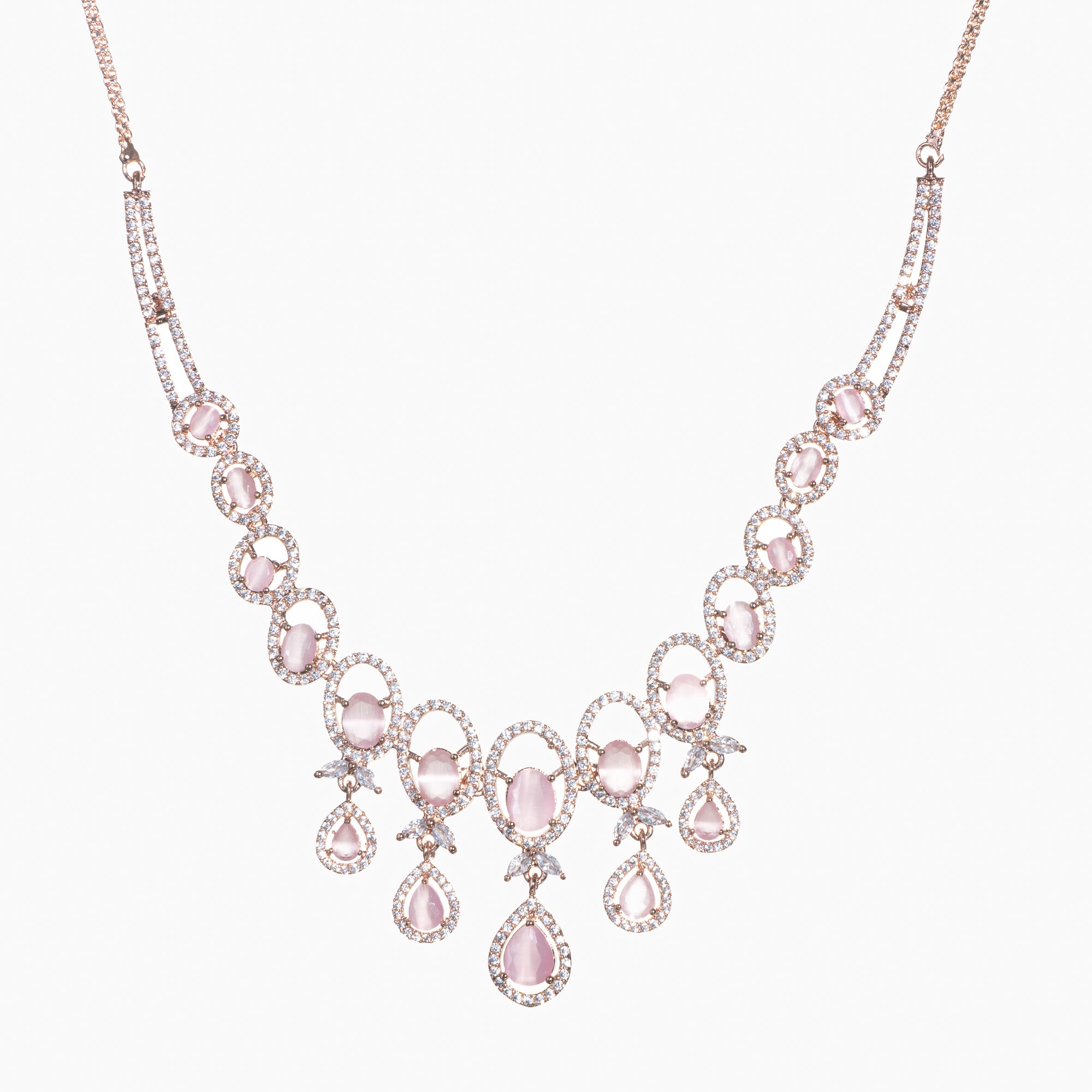 Pink zircon necklace with rose gold polish adds a chic and elegant finishing touch