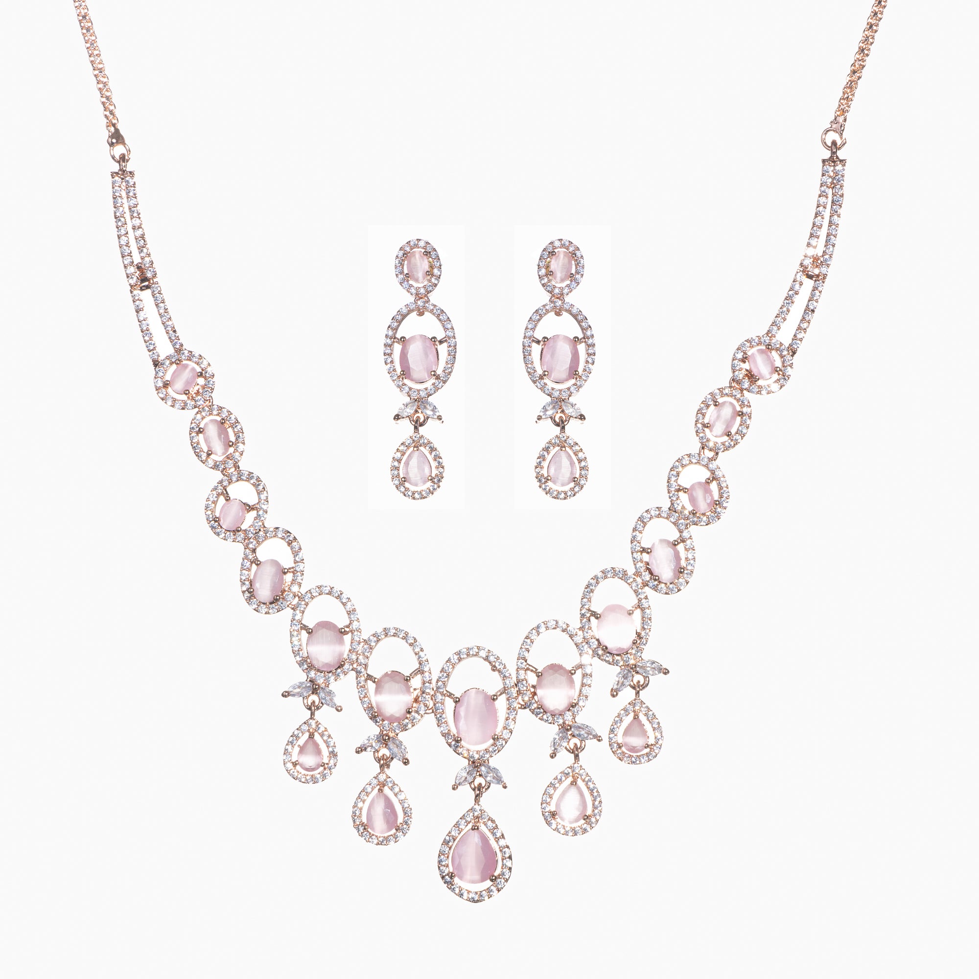 Pink zircon necklace with rose gold polish adds a chic and elegant finishing touch