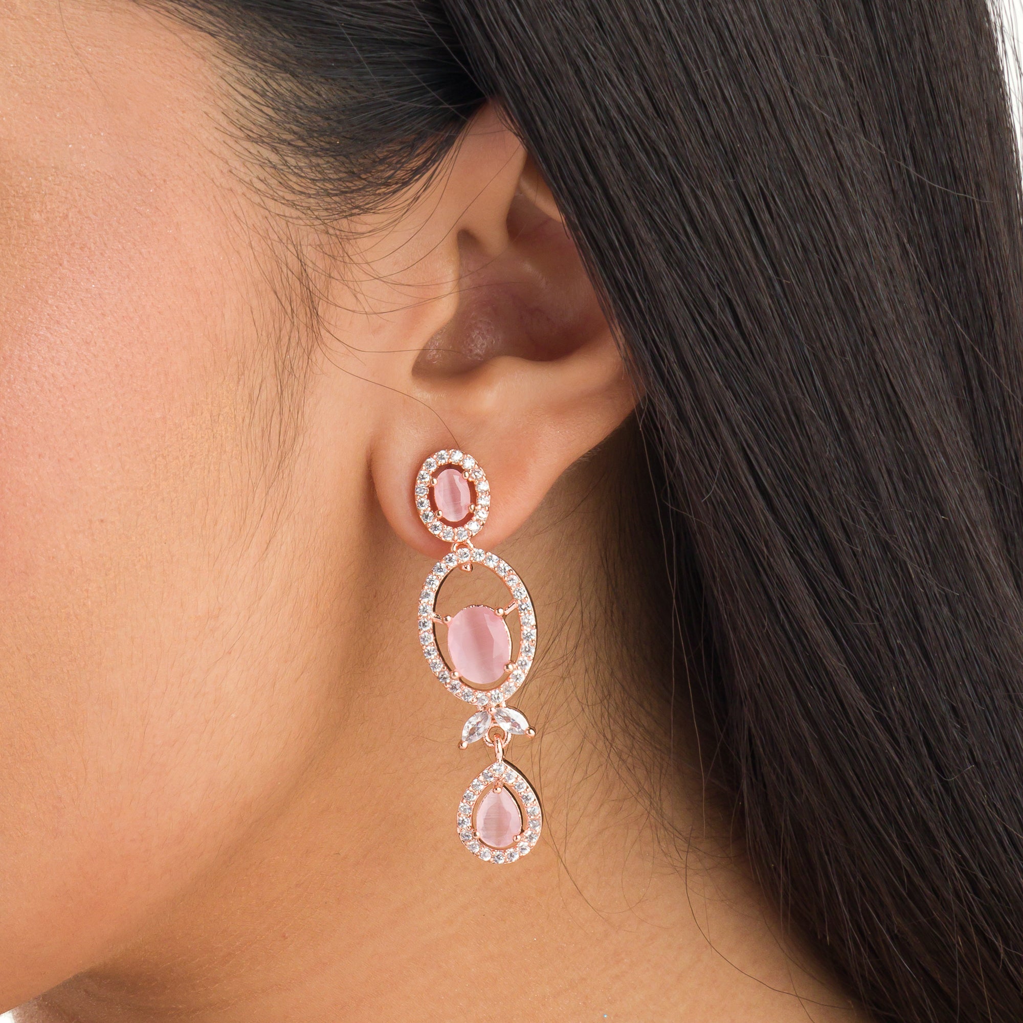 Pink zircon necklace with rose gold polish adds a chic and elegant finishing touch