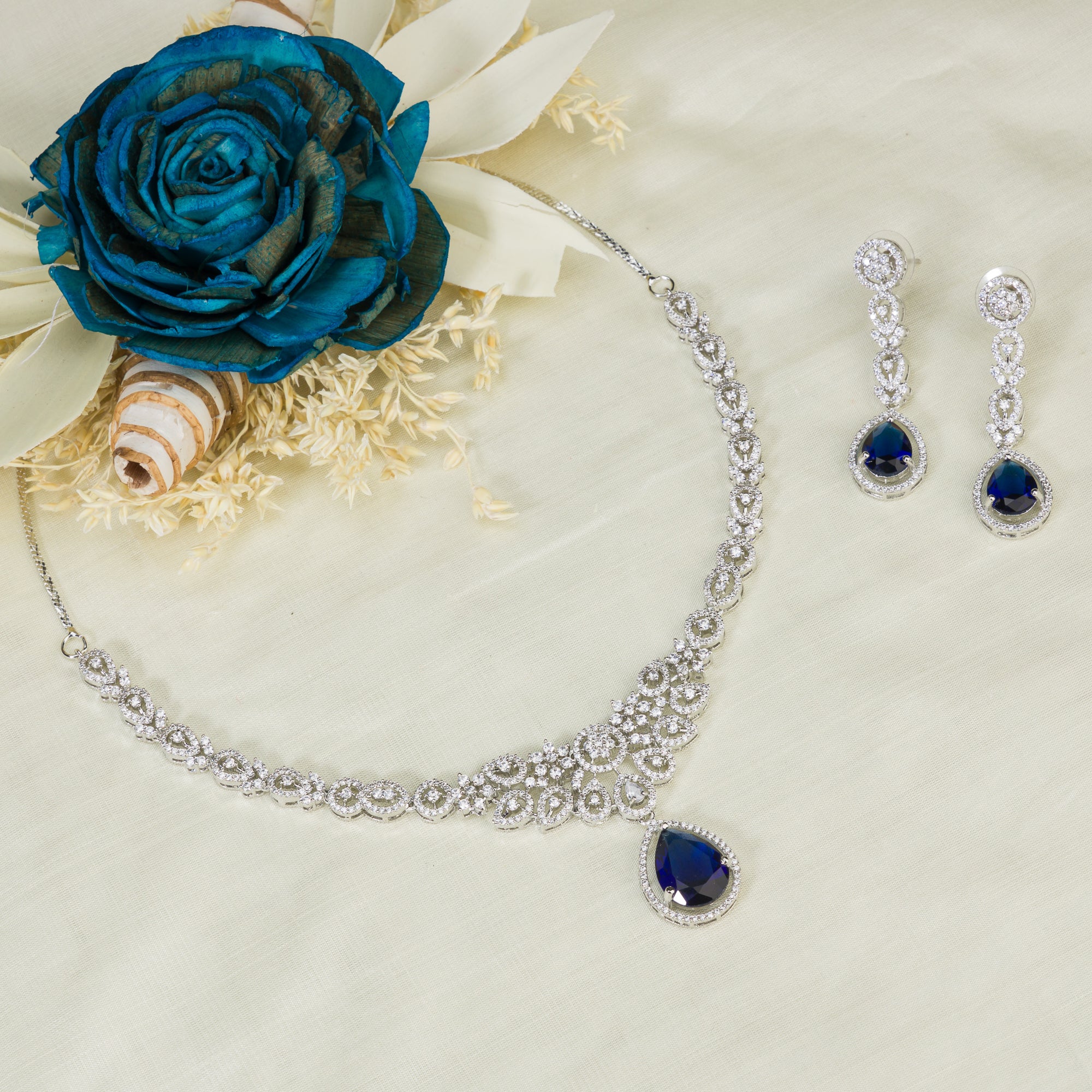 "Navy blue zircon necklace with large stone makes a bold, elegant statement for any occasion."