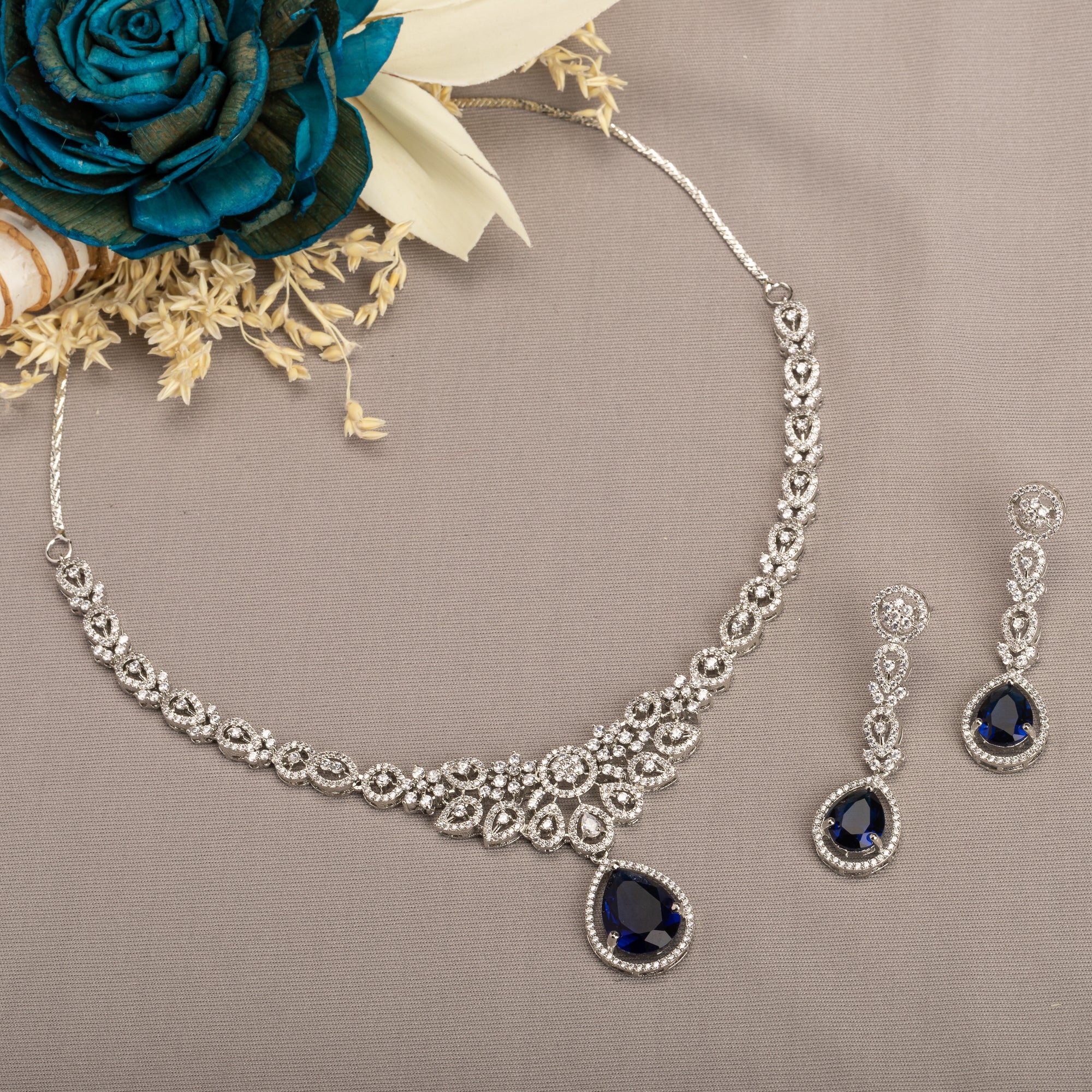 "Navy blue zircon necklace with large stone makes a bold, elegant statement for any occasion."