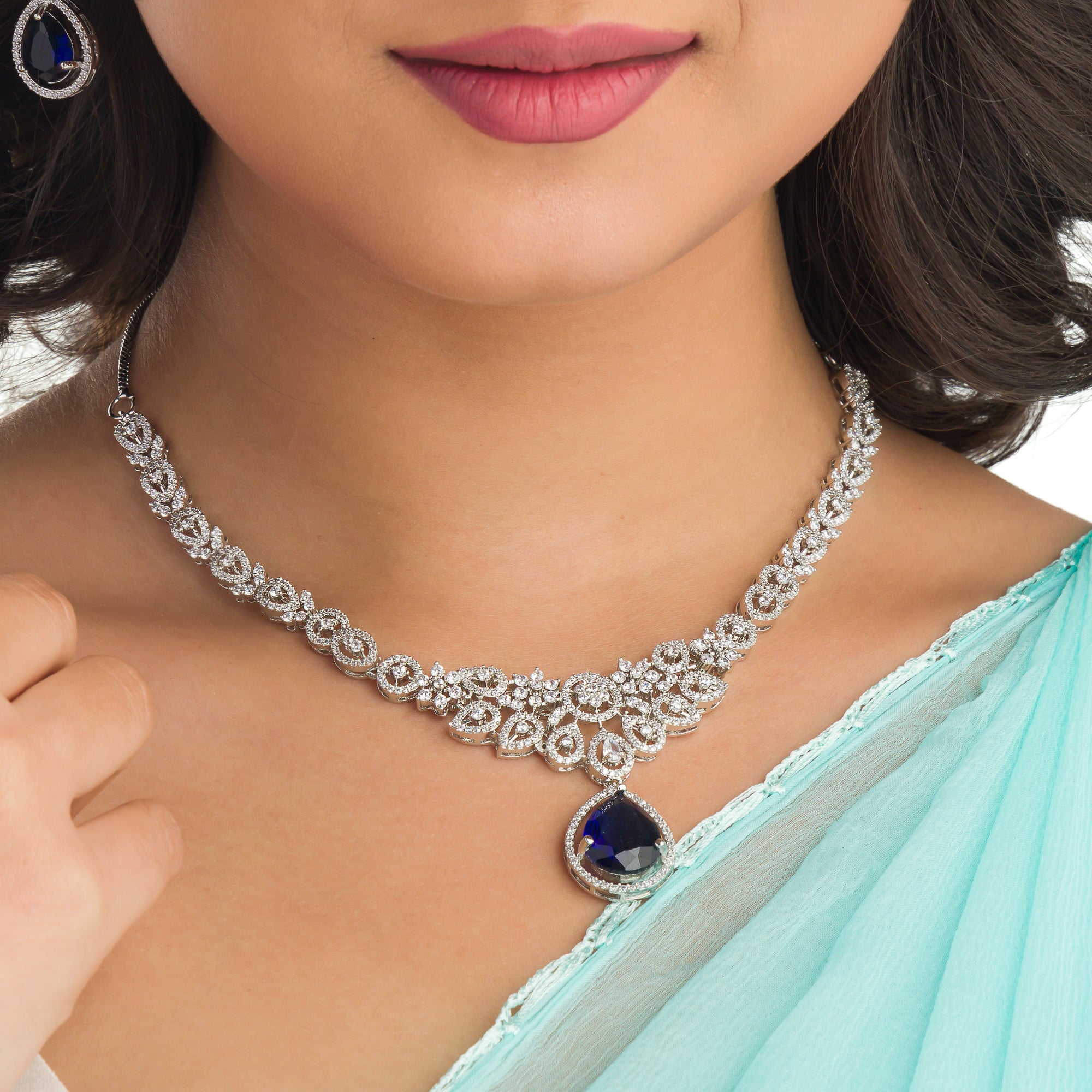 "Navy blue zircon necklace with large stone makes a bold, elegant statement for any occasion."