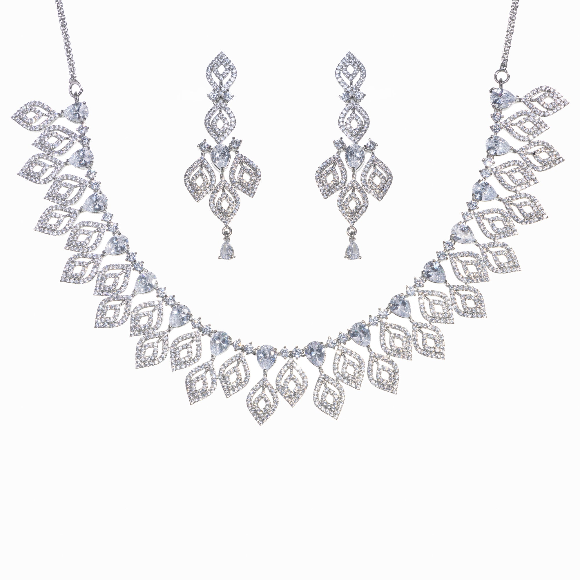 "Silver zircon necklace with leaf motifs adds natural elegance and sophisticated charm."