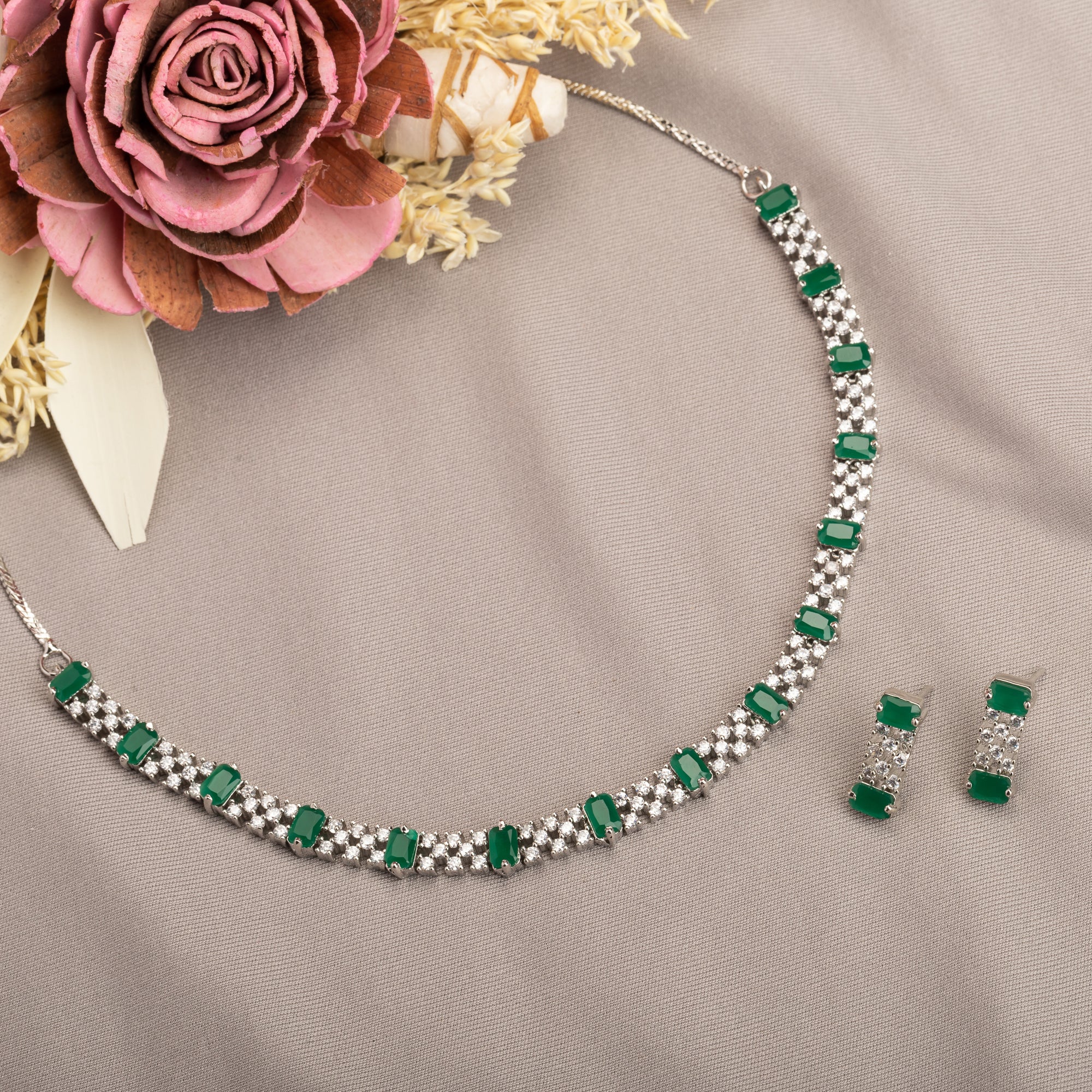 "Green stone zircon necklace adds a pop of vibrant elegance to any look."