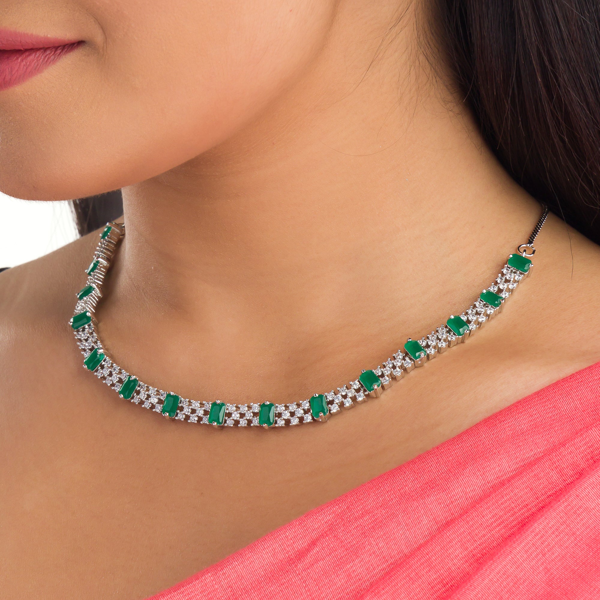 "Green stone zircon necklace adds a pop of vibrant elegance to any look."