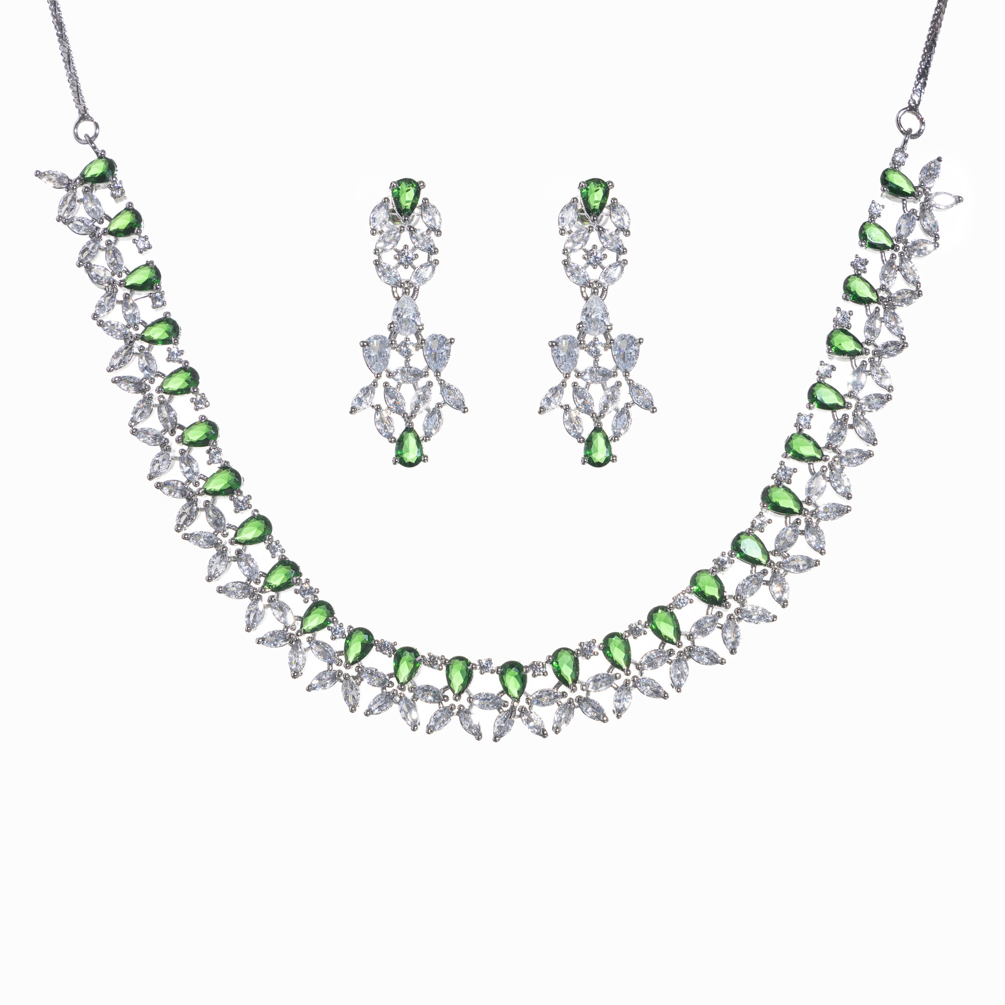 "Green and white zircon necklace in floral design adds vibrant, floral elegance."