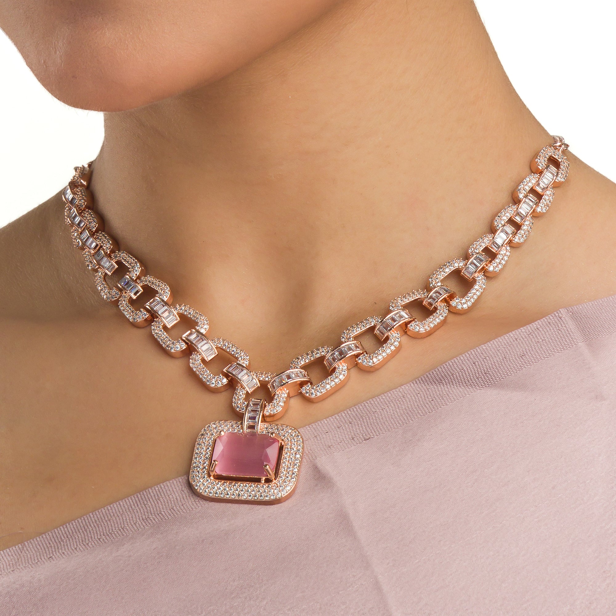 "Pink square and white zircon necklace with rose gold polish shines elegantly."